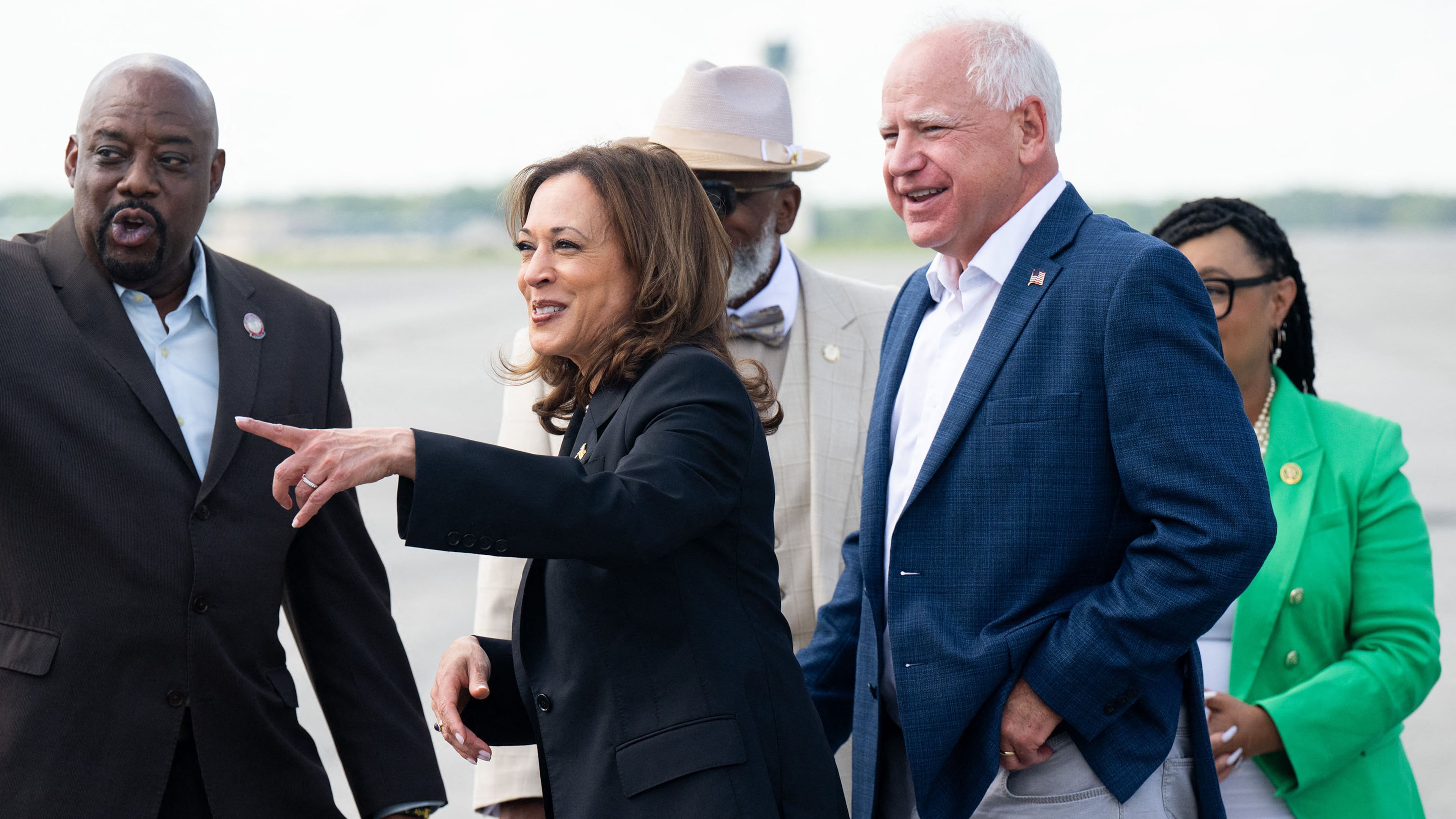 Vice President and Democratic presidential candidate Kamala Harris (center) and her running mate, Minnesota Gov. Tim Walz (right), arrive at Savannah/Hilton Head International Airport in August for a campaign tour. (Saul Loeb/AFP/Getty Images/TNS)