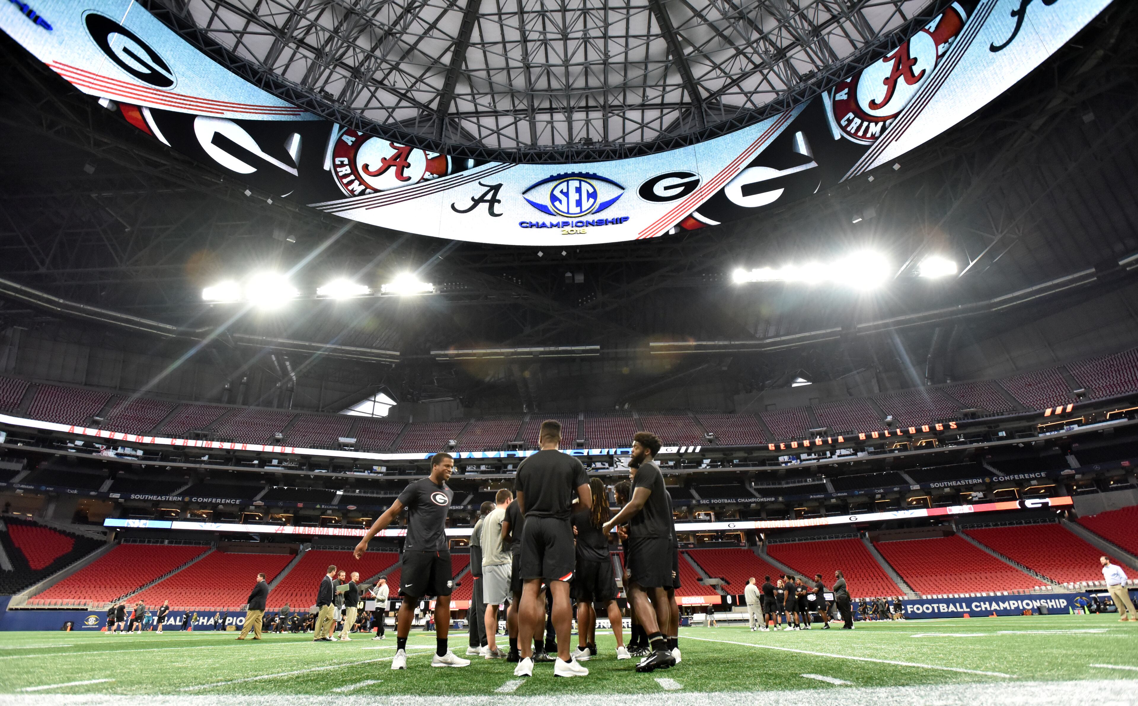 November 30, 2018 Atlanta - Georgia football players enters the football field before their team practice at Mercedes-Benz Stadium on Friday, November 30, 2018. HYOSUB SHIN / HSHIN@AJC.COM