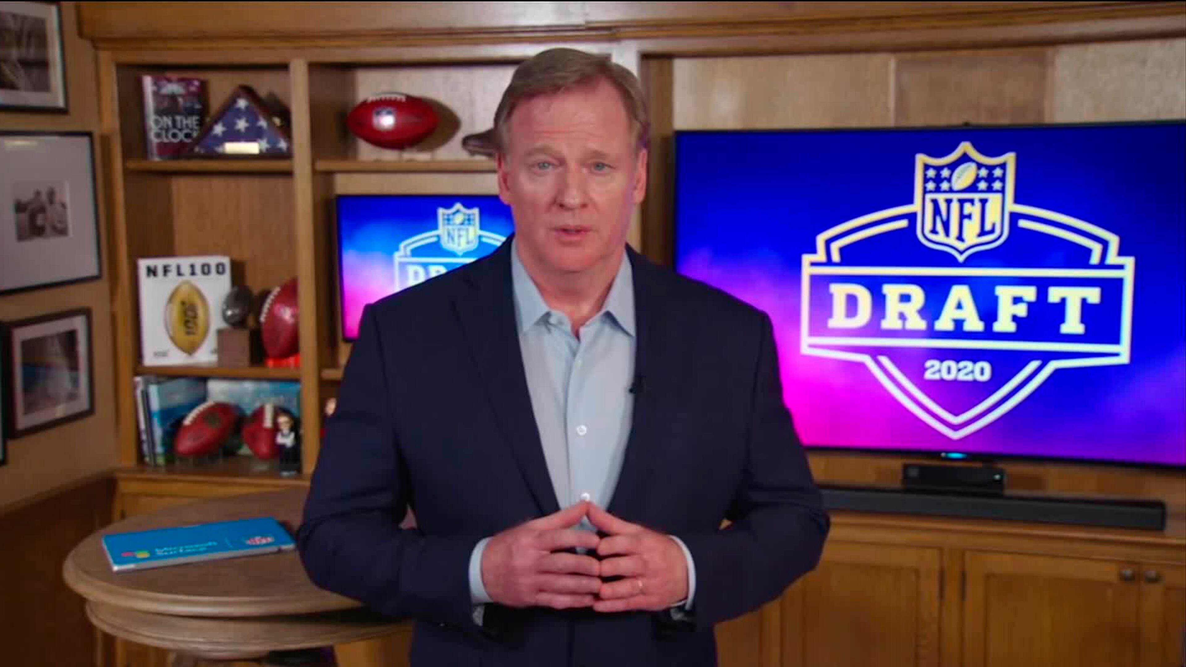 In this still image from video provided by the NFL, NFL Commissioner Roger Goodell speaks from his home in Bronxville, N.Y., during the NFL football draft Thursday, April 23, 2020. (NFL via AP)