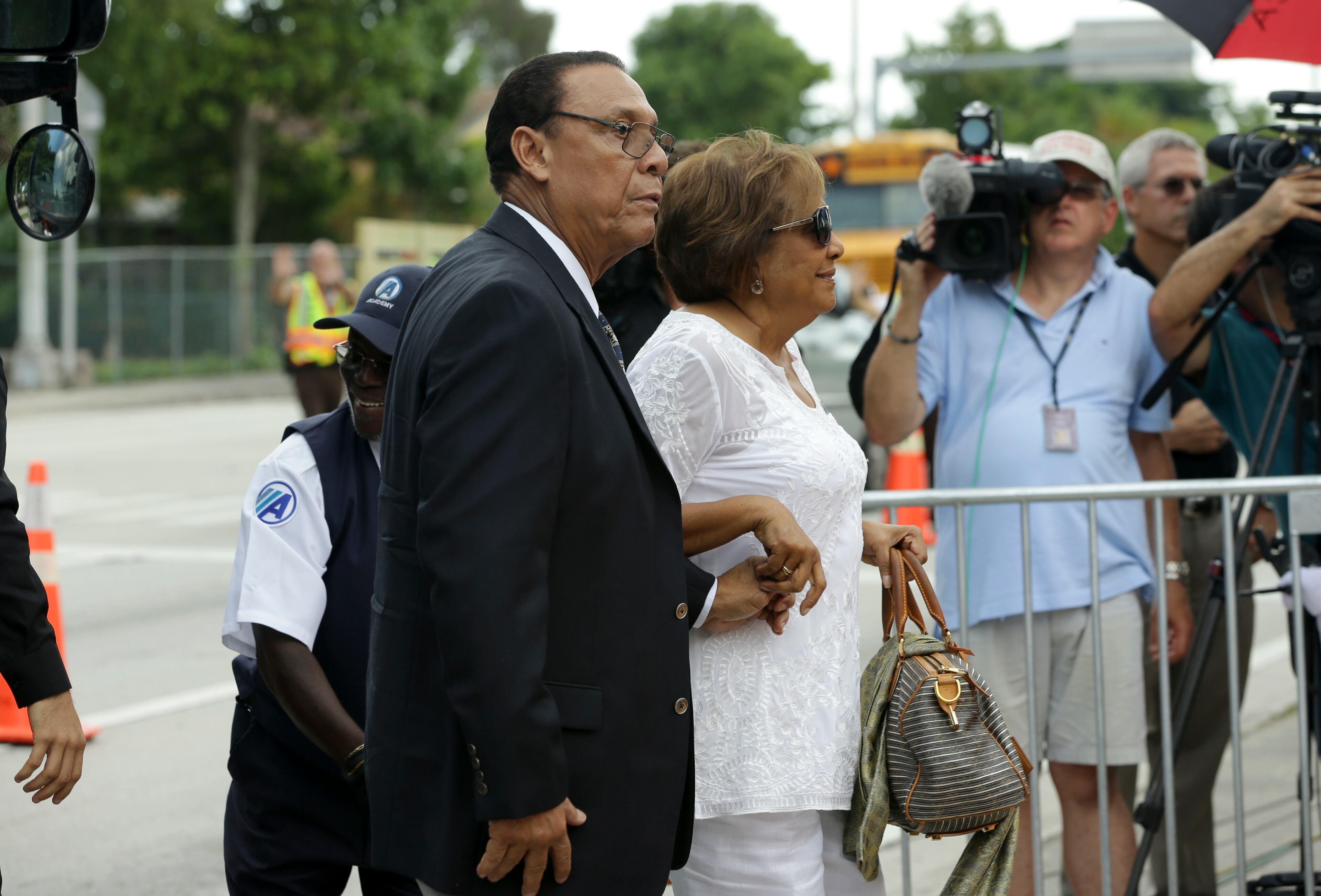Miami Marlins special assistant Tony Perez, left, arrives for a memorial service for Miami Marlins pitcher Jose Fernandez, at St. Brendan's Catholic Church, Thursday, Sept. 29, 2016, in Miami. Fernandez was killed in a boating accident Sunday along with two friends. (AP Photo/Lynne Sladky)