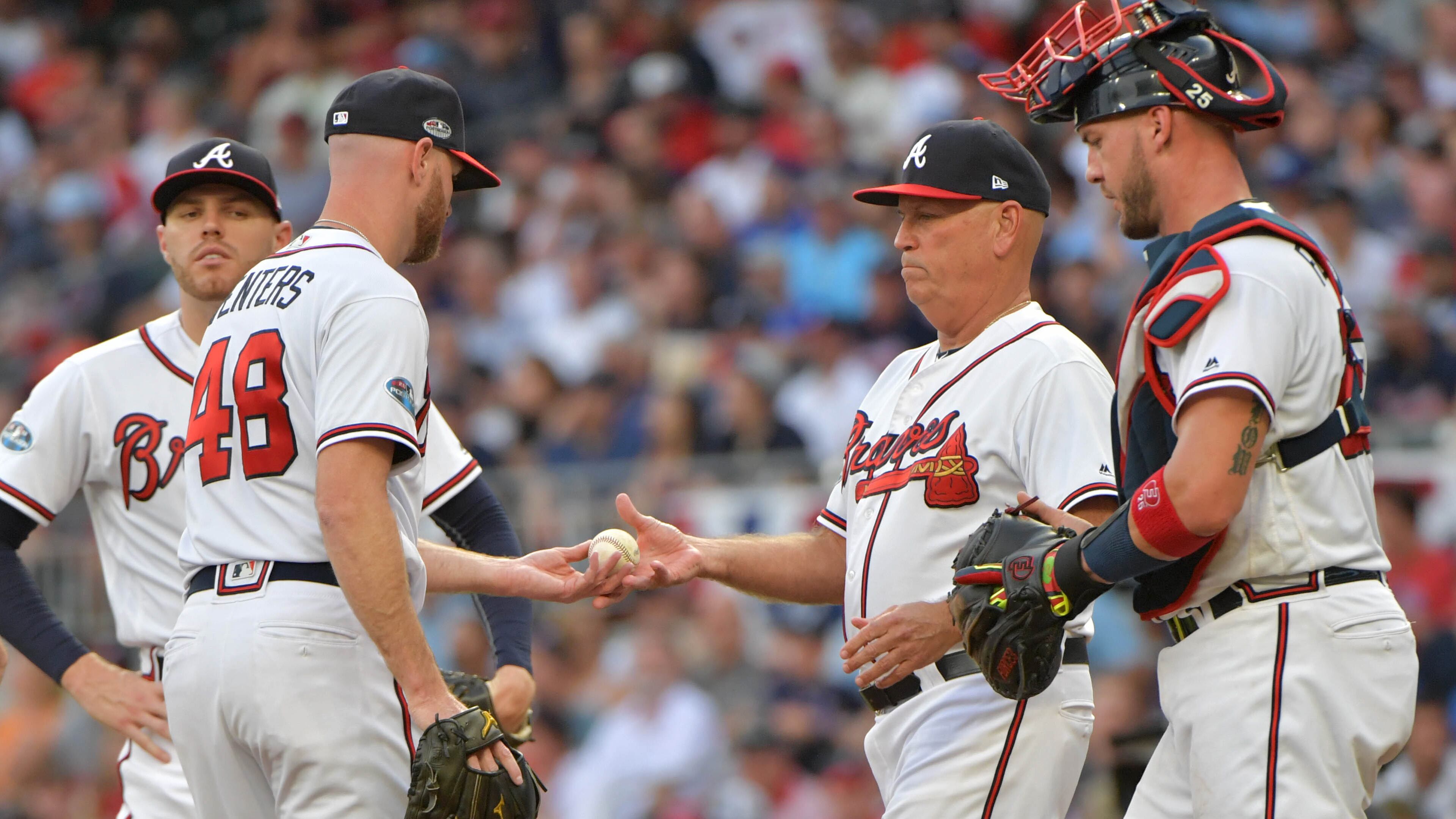 October 8, 2018 - Atlanta: Atlanta Braves manager Brian Snitker gives the ball to relief pitcher Jonny Venters (48) during a pitching change in the sixth inning against the Los Angeles Dodgers in Game 4 of a National League Division Series baseball game Monday, October 8, 2018, in Atlanta. Hyosub Shin/hshin@ajc.com