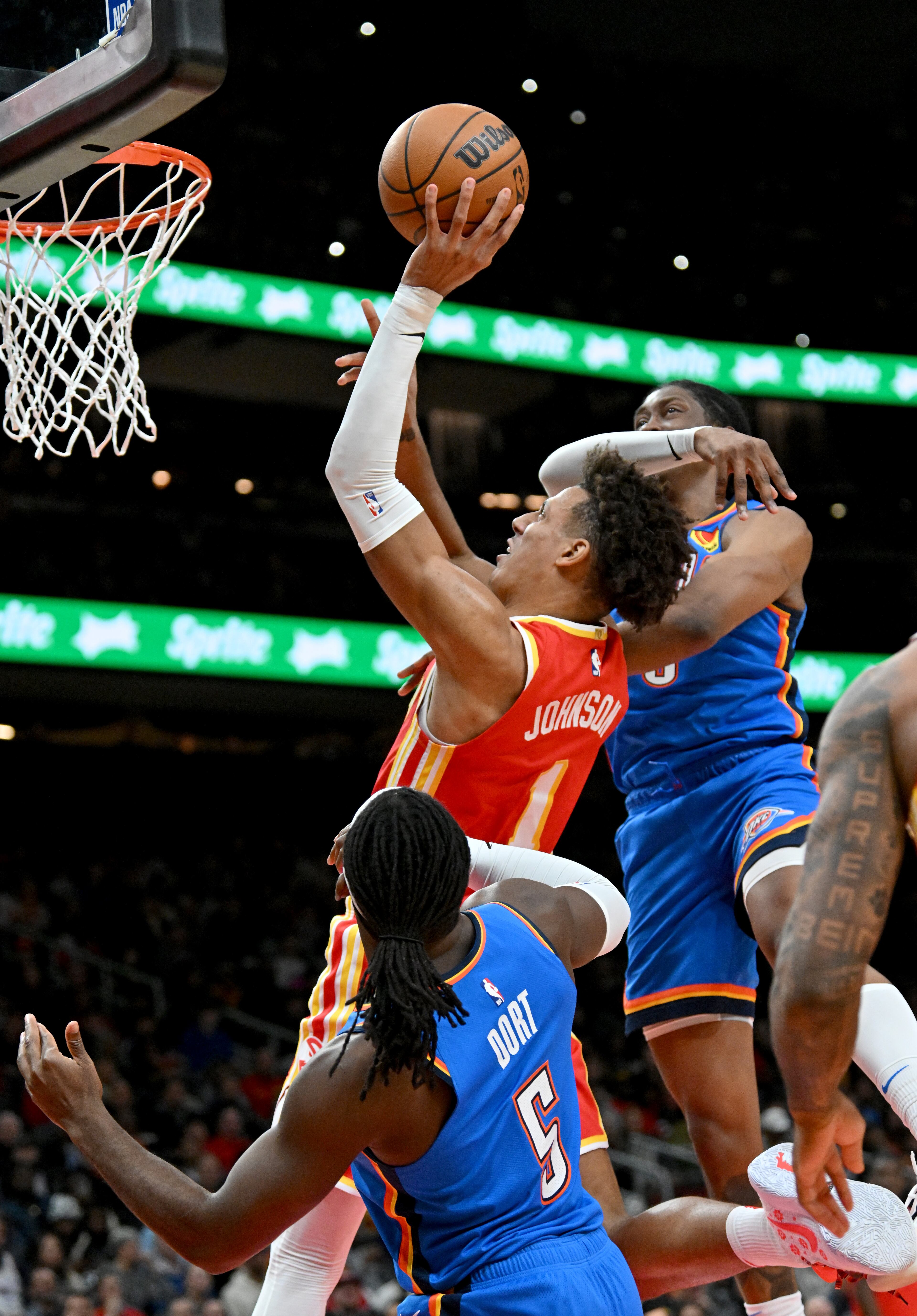 Atlanta Hawks forward Jalen Johnson (1) goes to the basket during the first half in an NBA basketball game at State Farm Arena, Wednesday, December 3, 2024, in Atlanta. (Hyosub Shin / Hyosub.Shin@ajc.com)