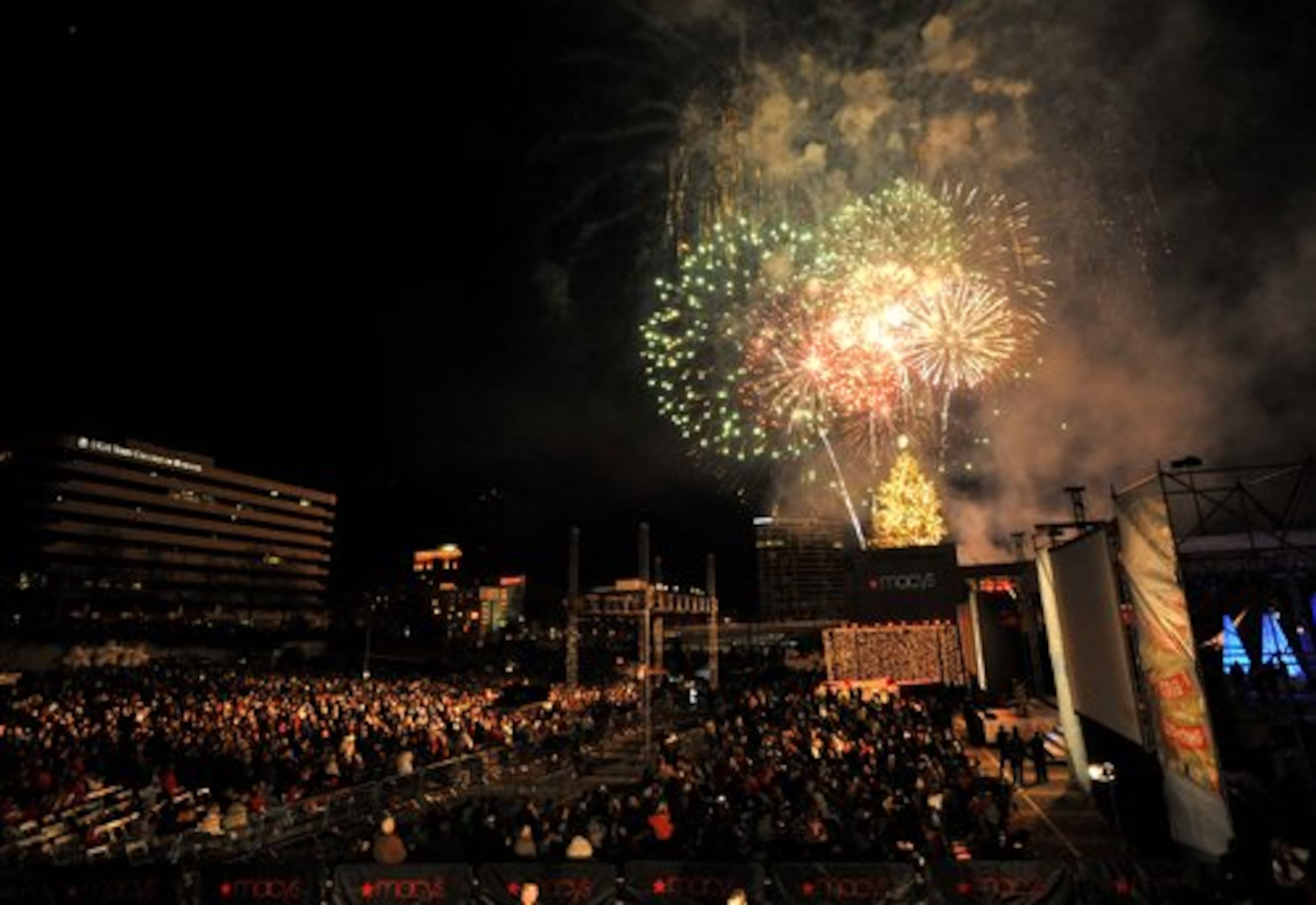 Fireworks go off after the Macy's Great Tree Lighting at Lenox Square Mall on Thursday, November 24, 2011.
