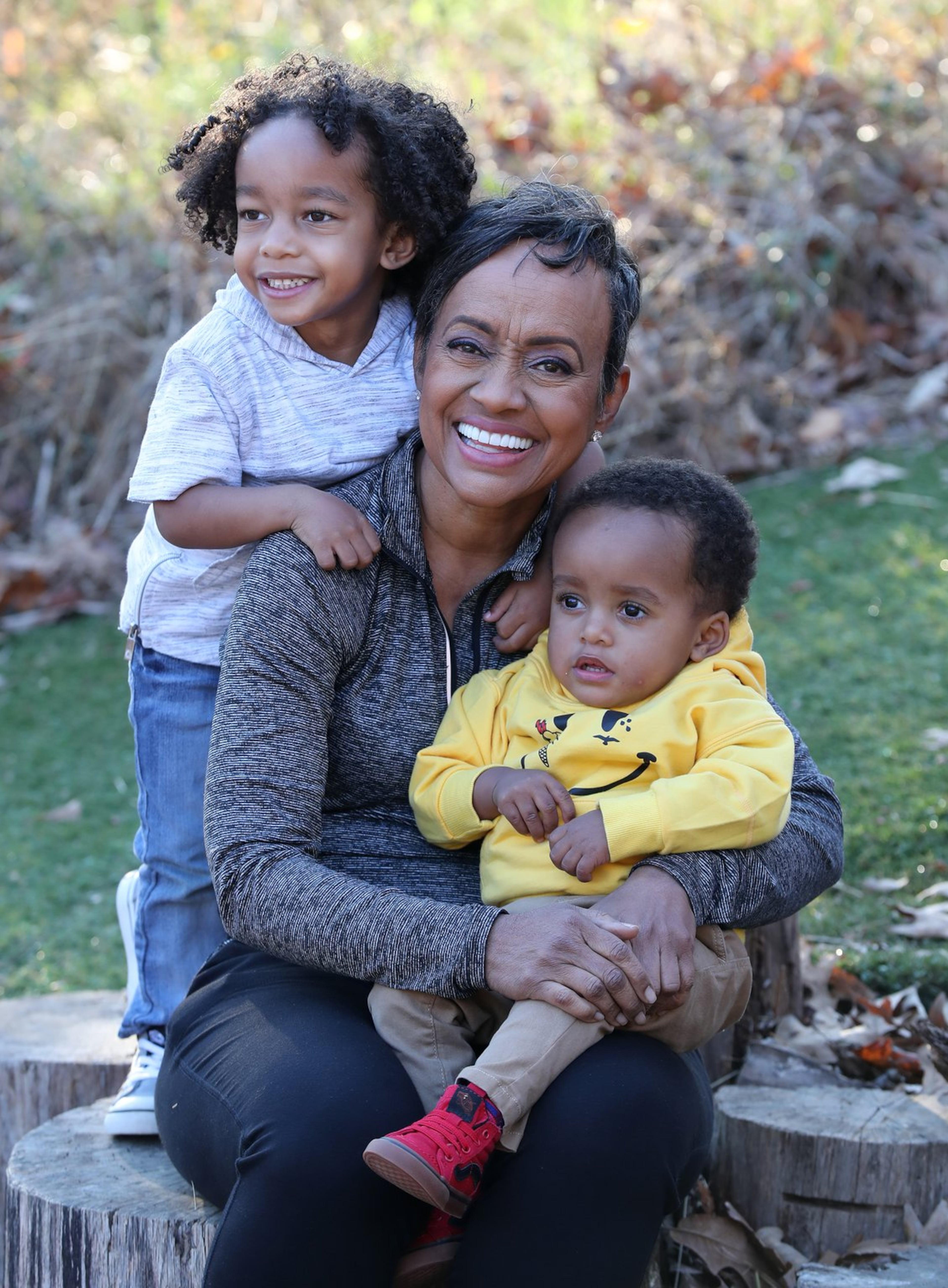 Judge Glenda Hatchett plays with her grandsons Langston, 1, and Charles Johnson the fifth, 3, during an afternoon at the children’s playground at Chastain Park on . Hatchett is helping her son raise awareness about maternal deaths after losing her daughter in law, Kira Dixon Johnson after she gave birth to her second grandson. Curtis Compton/ccompton@ajc.com
