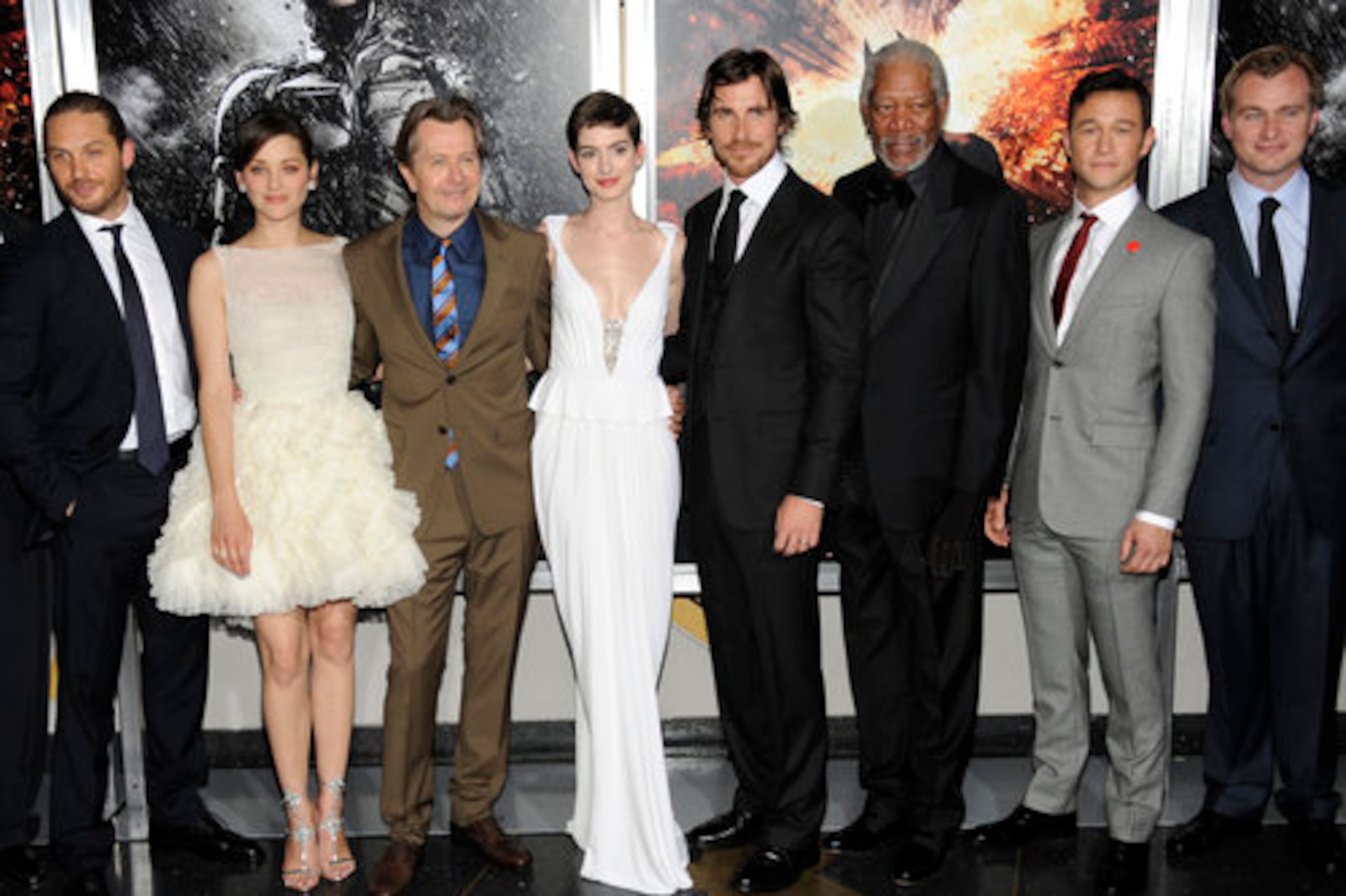 Actors (from left) Tom Hardy, Marion Cotillard, Gary Oldman, Anne Hathaway, Christian Bale, Morgan Freeman, Joseph Gordon-Levitt and director Christopher Nolan pose together at the world premiere of "The Dark Knight Rises" on Monday July 16, 2012, in New York.