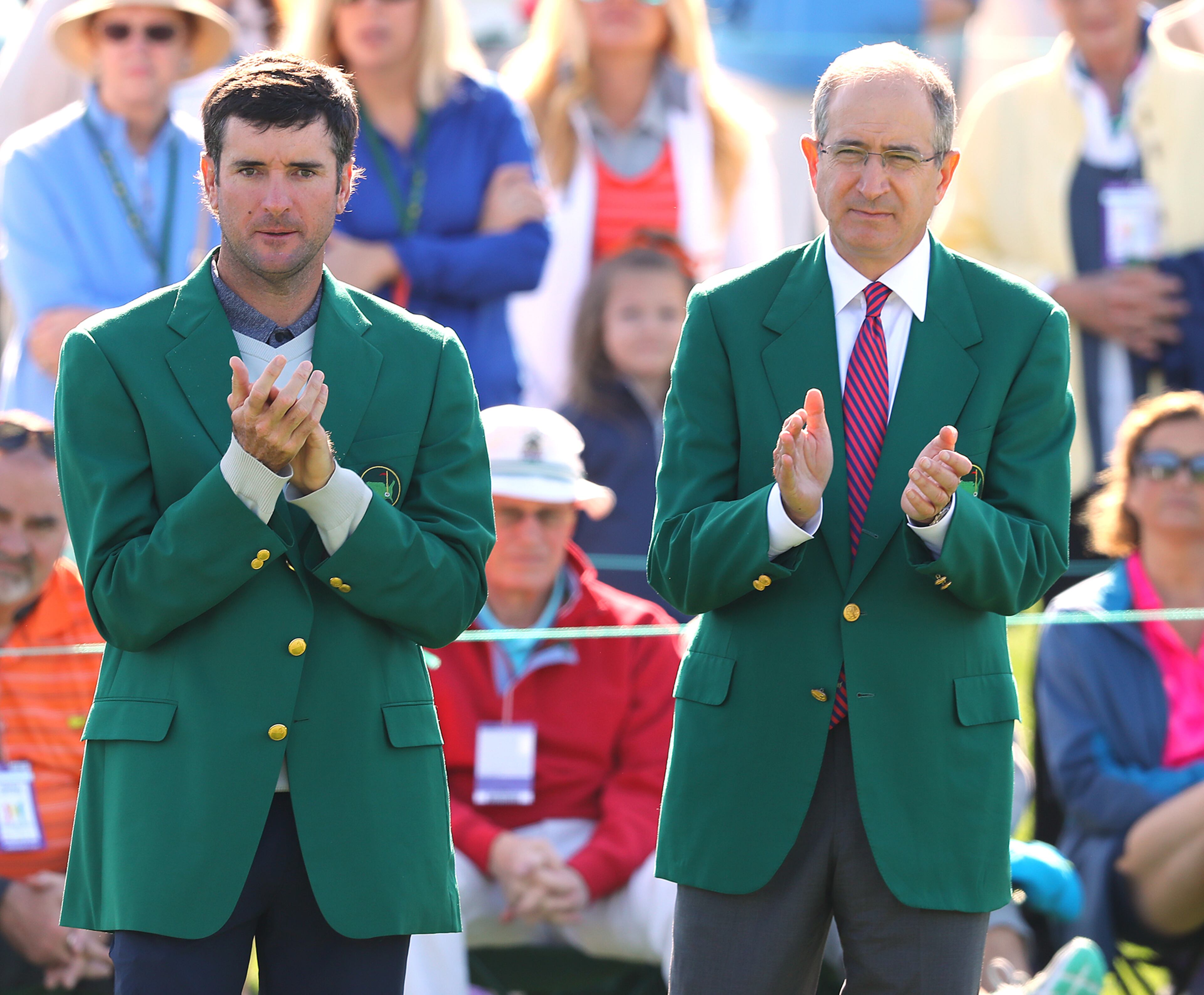 April 1, 2018 Atlanta: Two time Masters champion Bubba Watson and Comcast CEO Brian L. Roberts applaude young participants on the 18th green during the Drive Chip & Putt National Finals at Augusta National Golf Club on Sunday, April 1, 2018, in Augusta. Curtis Compton/ccompton@ajc.com