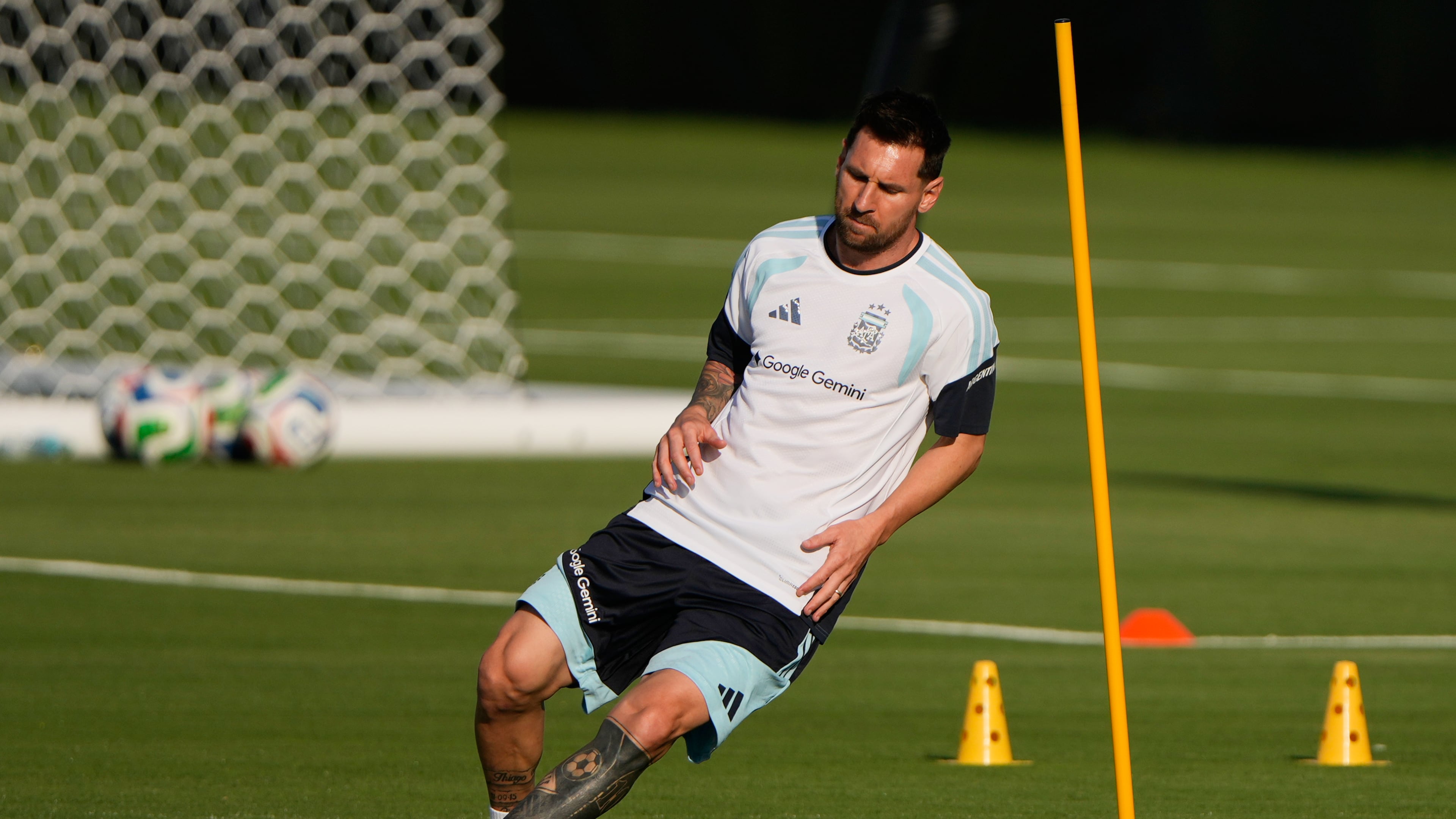 Argentina forward Lionel Messi works out during practice for the FIFA World Cup soccer Wednesday, June 3, 2026, in Kansas City, Kan.. (AP Photo/Charlie Riedel)