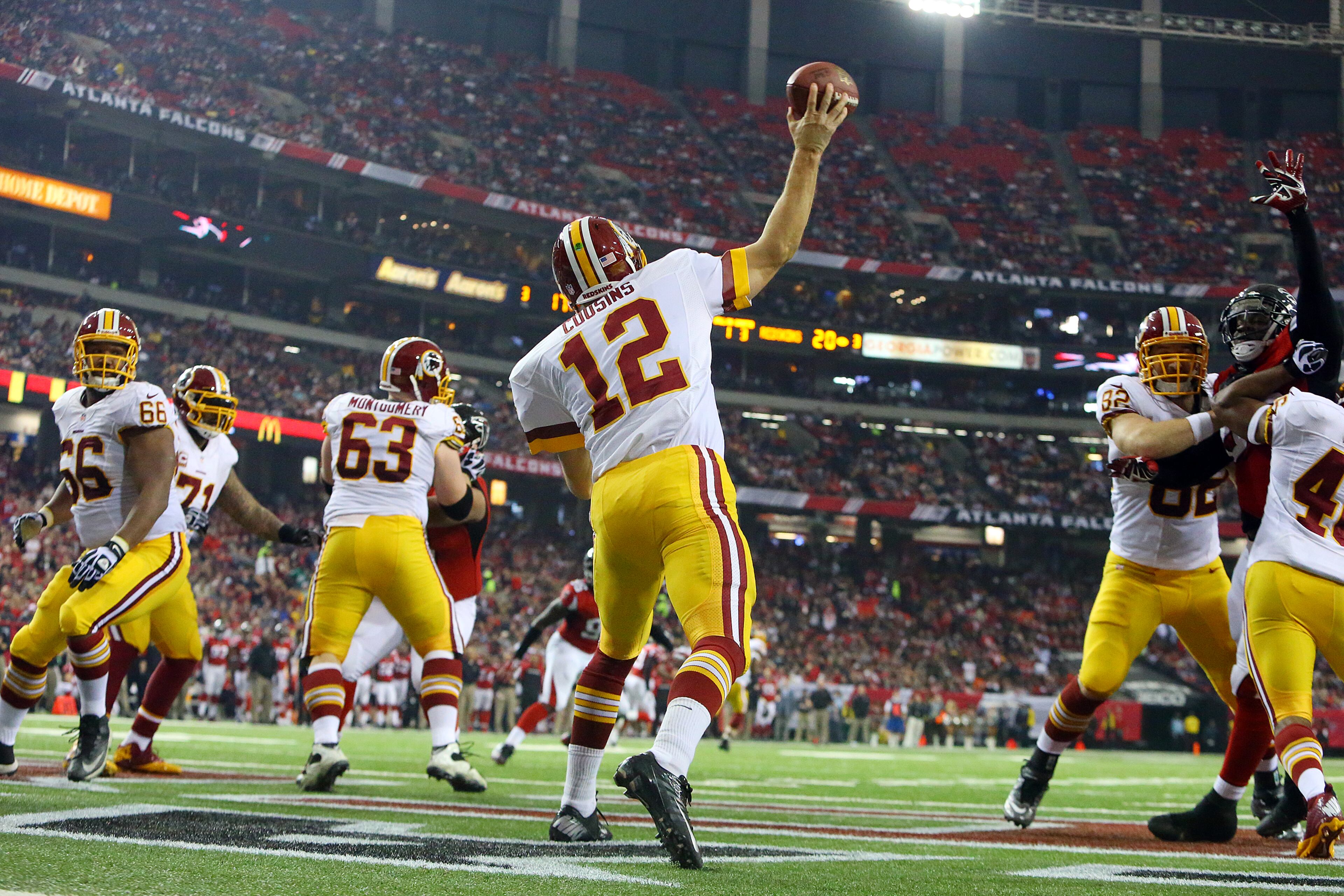 Redskins quarterback Kirk Cousins throws a costly interception from his own endzone to Falcons safety William Moore setting up a Falcons touchdown during the second half of a NFL football game on Sunday, Dec. 15, 2013, in Atlanta.