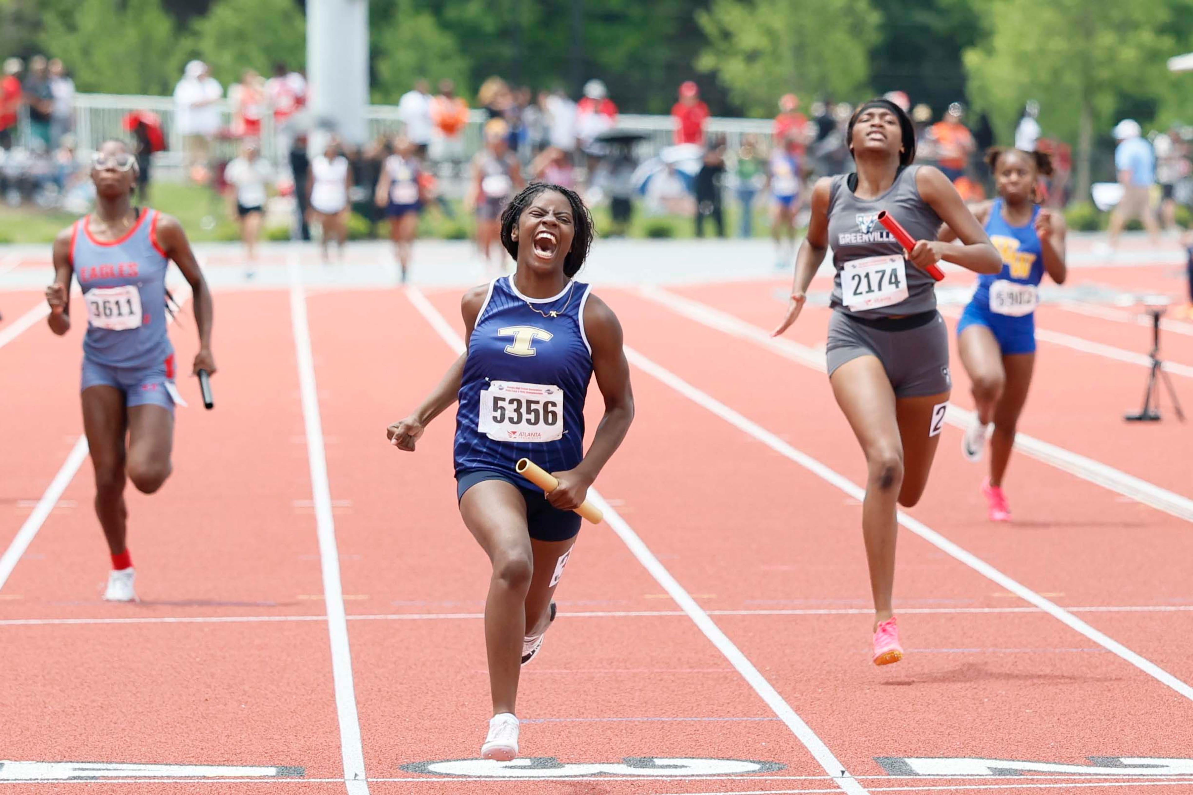 Taylor County High School runner reacts as she crosses the finish line after winning the Girls 4x100 Meter Relay 1A Division 2 at the GHSA track and field state championships held at UGA’s Spec Towns Track on Monday, May 11, 2026, in Athens. (Miguel Martinez/AJC)