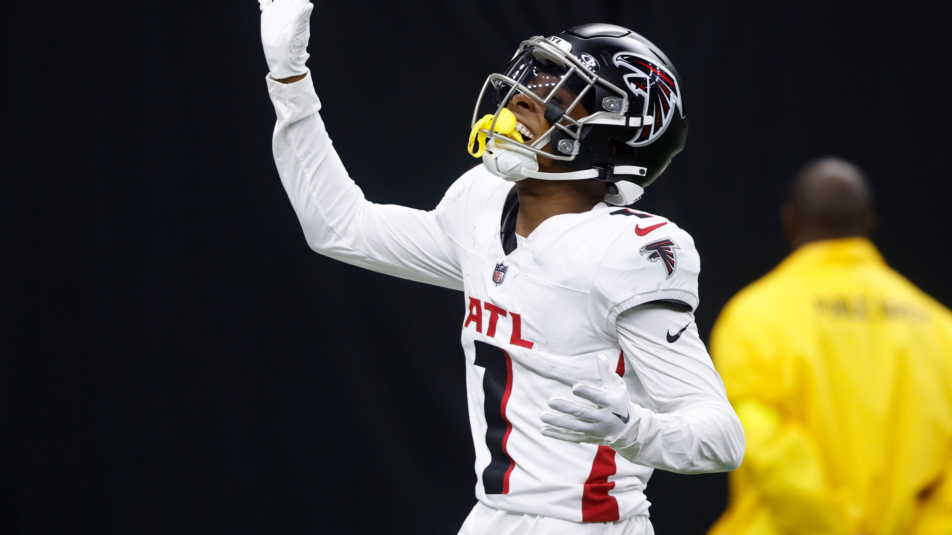 Atlanta Falcons wide receiver Darnell Mooney celebrates a touchdown reception against the New Orleans Saints in the second half of an NFL football game, Sunday, Nov. 23, 2025, in New Orleans. (AP Photo/Butch Dill)