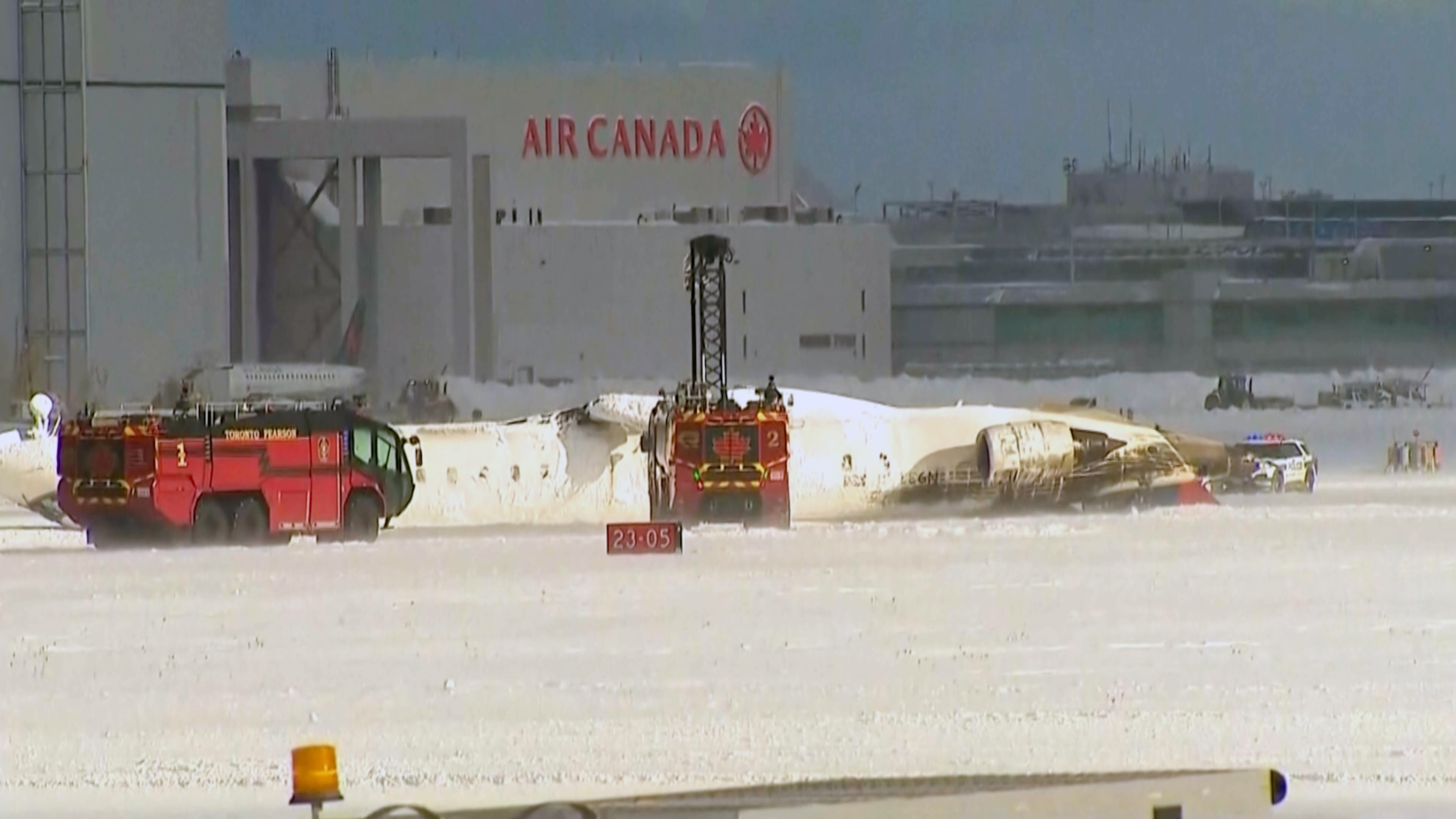 A Delta regional jet flipped on arrival at Toronto’s Pearson Airport in February. There were no fatalities among the 80 people on board. (File/AP)