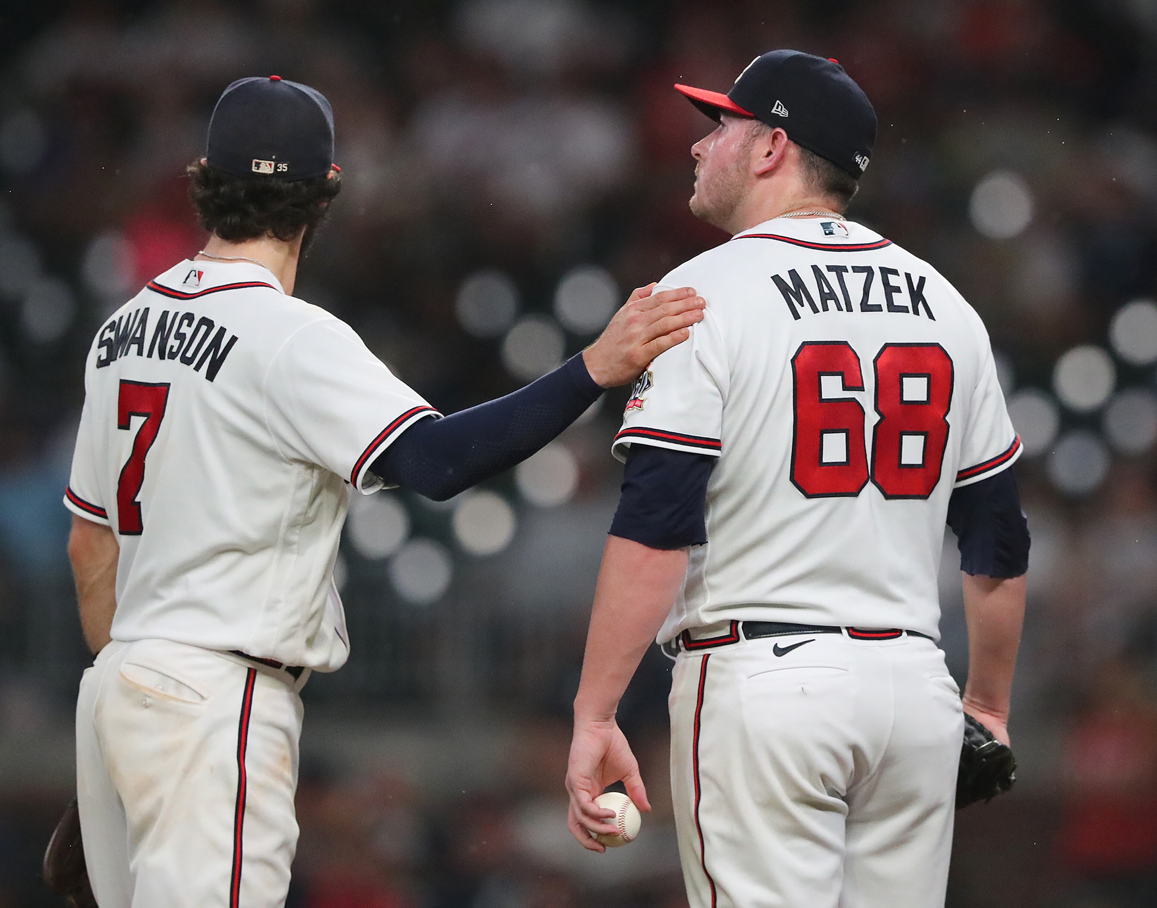 Braves pitcher Tyler Matzek gets a pat on the shoulder from Dansby Swanson as he is pulled from the game after giving up 4 runs to the Washington Nationals during the seventh inning in a MLB baseball game on Tuesday, Sept 7, 2021, in Atlanta. “Curtis Compton / Curtis.Compton@ajc.com”