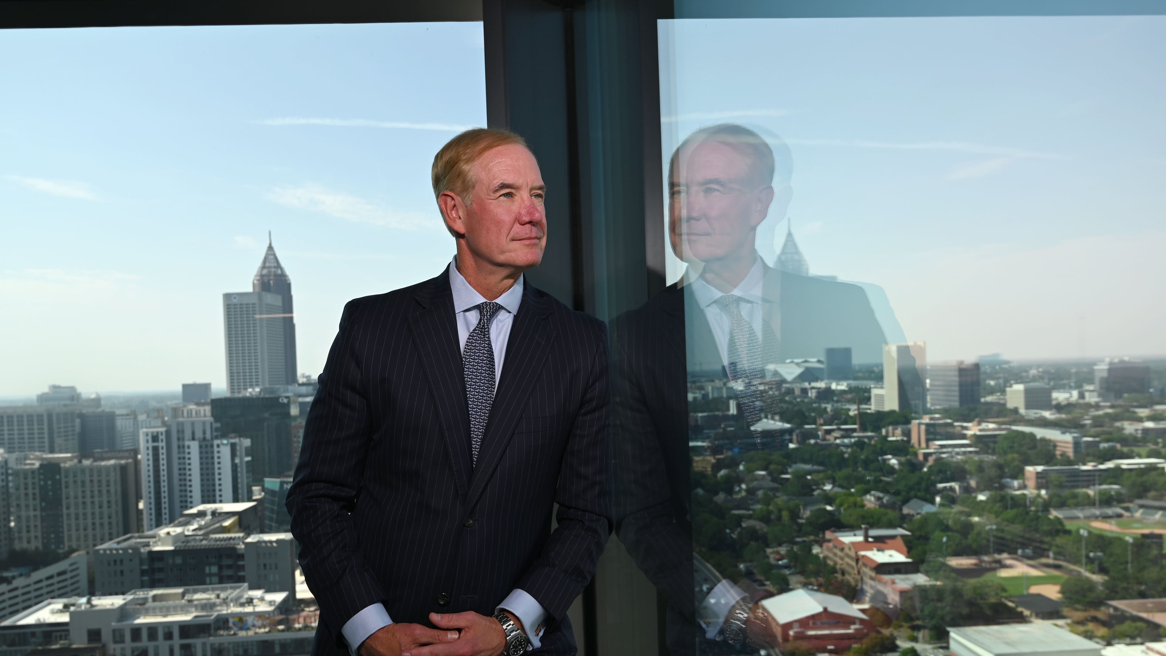 Kevin Blair, CEO of Pinnacle, on the top floor of the Ten Twenty Spring office tower at 1020 Spring St. NW on Friday, July 31, 2026, in Atlanta. Pinnacle will occupy 165,000 square feet of premier office space at Ten Twenty Spring and bring an estimated 400 team members to the building. (Hyosub Shin/AJC)