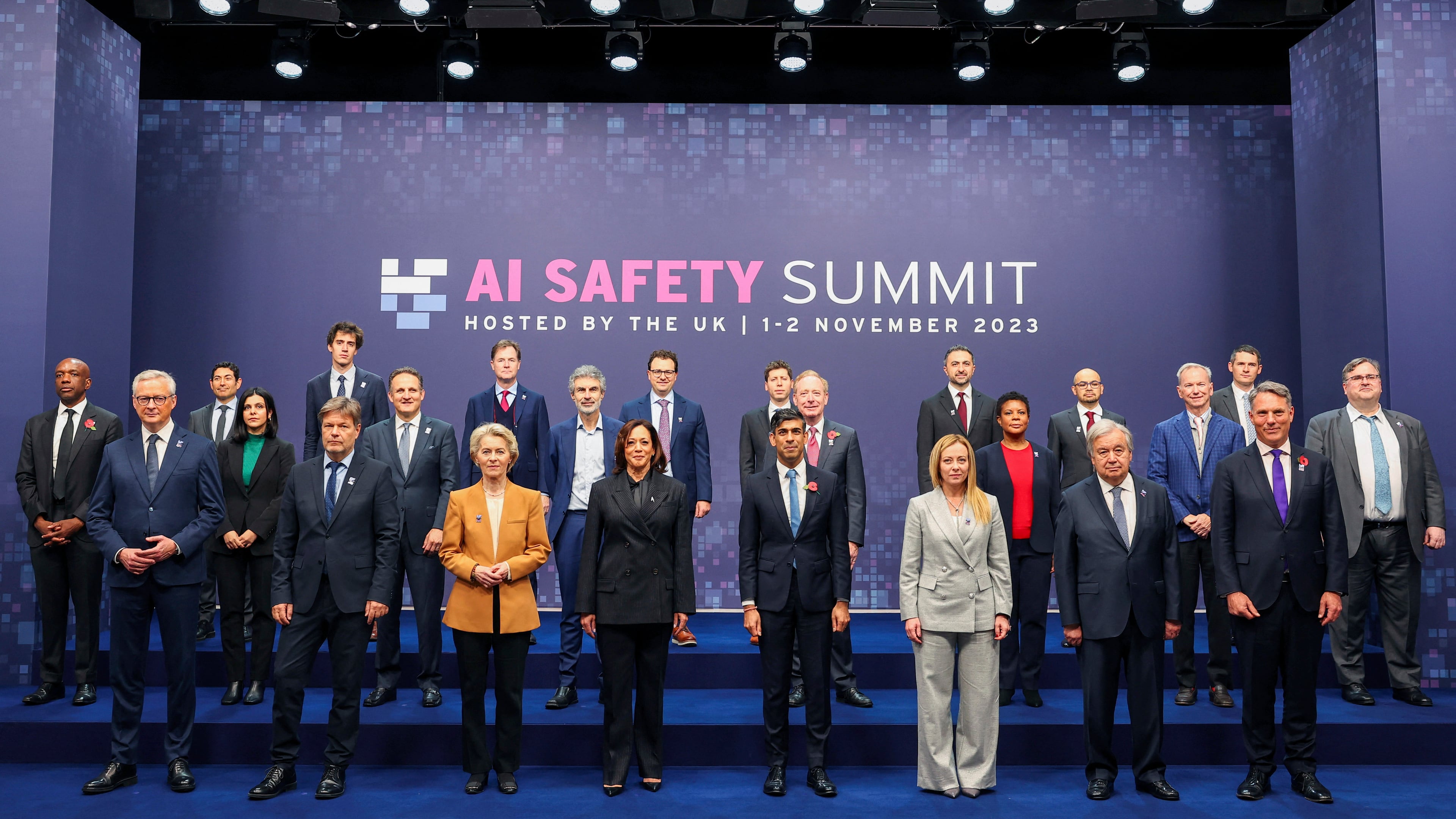 FILE - First row, from left, France's Minister for Economy, Finance, Industry and Digital Security Bruno Le Maire; German Economy and Climate Minister Robert Habeck, European Commission President Ursula von der Leyen, U.S. Vice President Kamala Harris, British Prime Minister Rishi Sunak, Italian Prime Minister Giorgia Meloni, U.N. Secretary General Antonio Guterres and Australian Deputy Prime Minister and Minister of Defense Richard Marles, middle and back row, from left, Google's James Manyika, President of the Carnegie Endowment for International Peace Tino Cuellar, AI Now Institute's Amba Kak, Mistral AI CEO Arthur Mensch, CEO of Amazon Web Services Adam Selipsky, Meta's Nick Clegg, Quebec AI Institute's Yoshua Bengio, Anthropic's Dario Amodei, OpenAI's Sam Altman, Microsoft's Brad Smith, Inflection AI Co-Founder Mustafa Suleyman, former acting director of the White House Office of Science and Technology Policy Alondra Nelson, Google DeepMind's Demis Hassabis, Schmidt Futures Founder Eric Schmidt, Chair of UK Frontier AI Taskforce Ian Hogarth and Inflection AI's Reid Hoffman pose for a group photo on the second day of the UK Artificial Intelligence Safety Summit at Bletchley Park, in Bletchley, England, on Nov. 2, 2023. The first international AI Safety Summit, held at a former codebreaking spy base near London, focused on cutting-edge “frontier” AI that some scientists warn could pose a risk to humanity’s very existence. Delegates from 28 nations, including the U.S. and China, agreed to work together to contain the potentially “catastrophic” risks posed by galloping advances in artificial intelligence. (Toby Melville/Pool Photo via AP, File)
