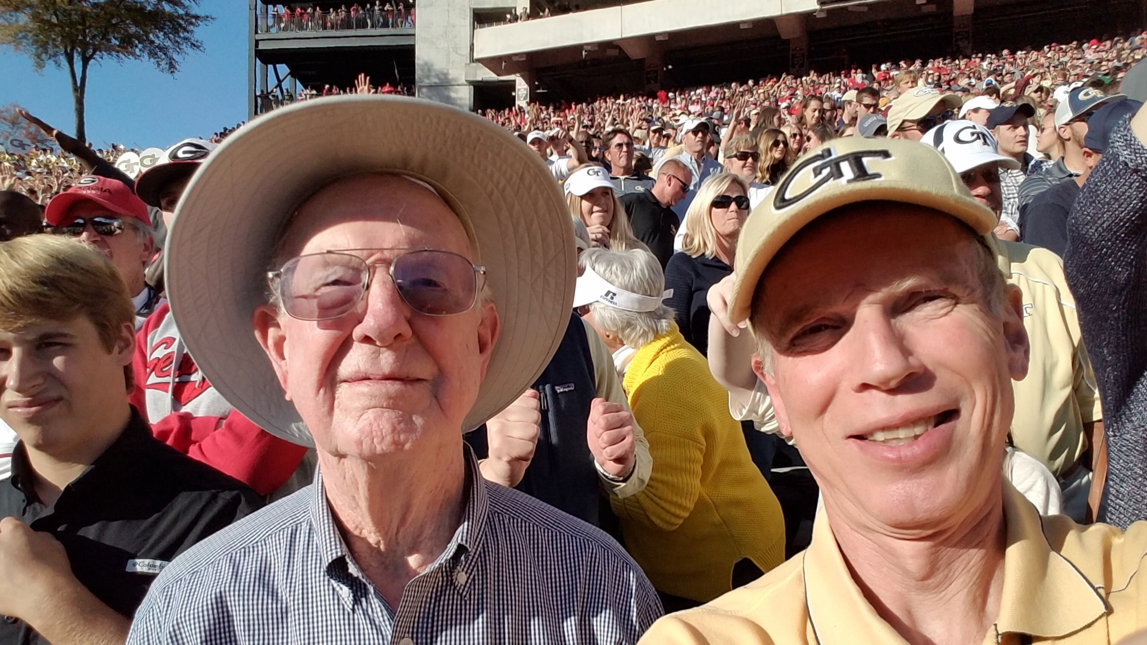 Georgia Tech alumnus Bobby Joe Anderson (left) with his son Stan Anderson (also a Tech graduate) at Tech's 2016 win over Georgia at Sanford Stadium. (Courtesy Stan Anderson)