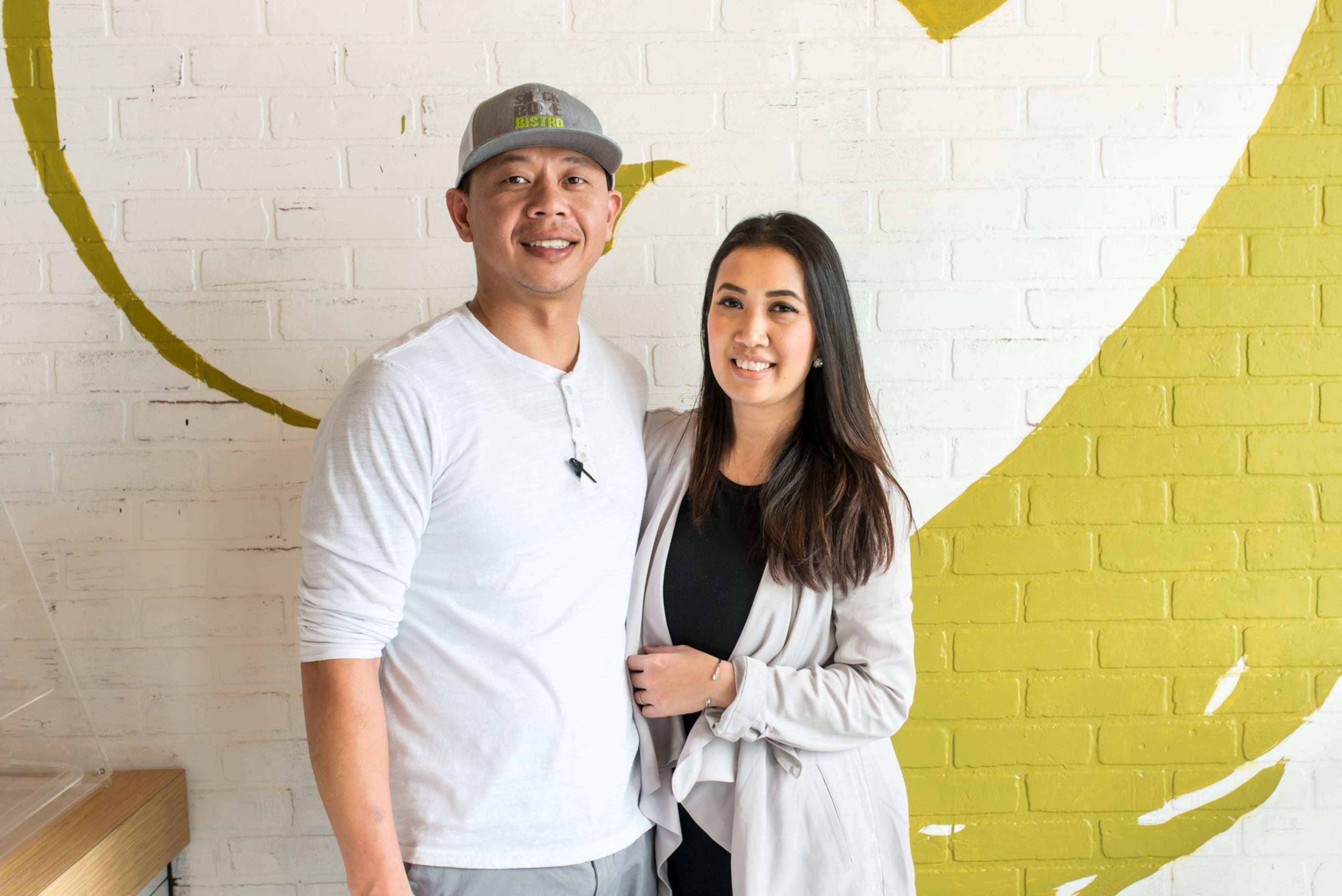Vanh Sengaphone and Thip Athakhanh are the husband and wife owners of Snackboxe Bistro in Doraville. Photo credit- Mia Yakel.