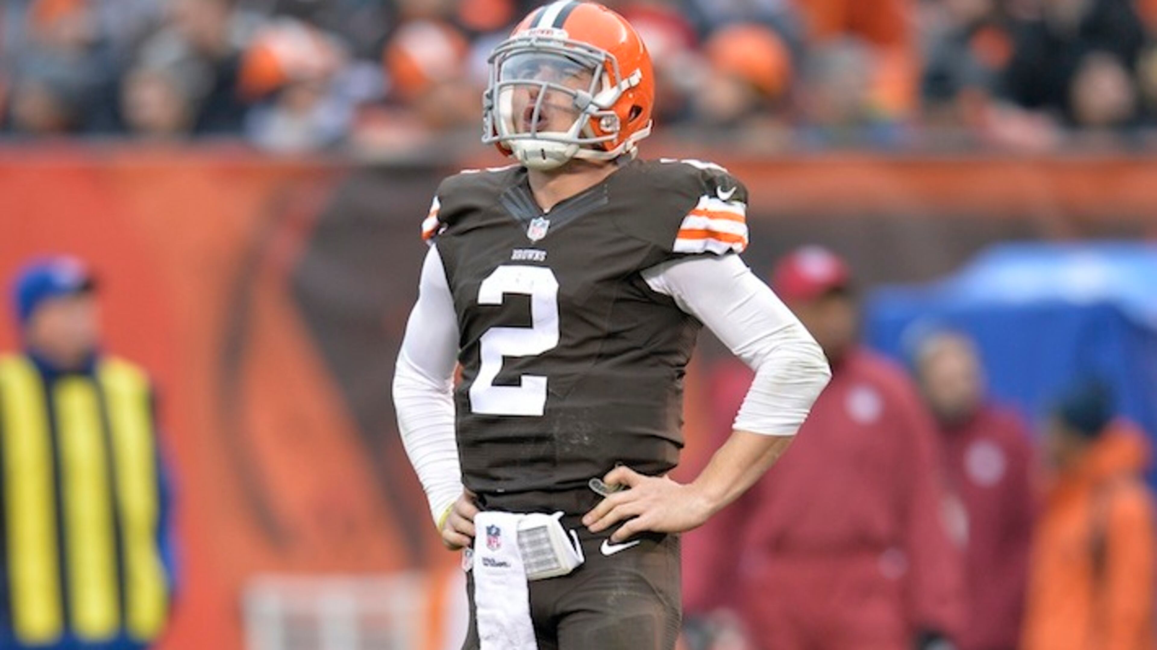 FILE - In this Dec. 14, 2014, file photo, Cleveland Browns quarterback Johnny Manziel reacts after being sacked in the third quarter of an NFL football game against the Cincinnati Bengals, in Cleveland. Troubled Browns quarterback Johnny Manziel was cited for driving with expired license plates last weekend. According to police in North Olmsted, Ohio, Manziel was stopped at 8:28 a.m. on Saturday, Jan. 3, 2016, while driving on Interstate 480 (AP Photo/David Richard, File)