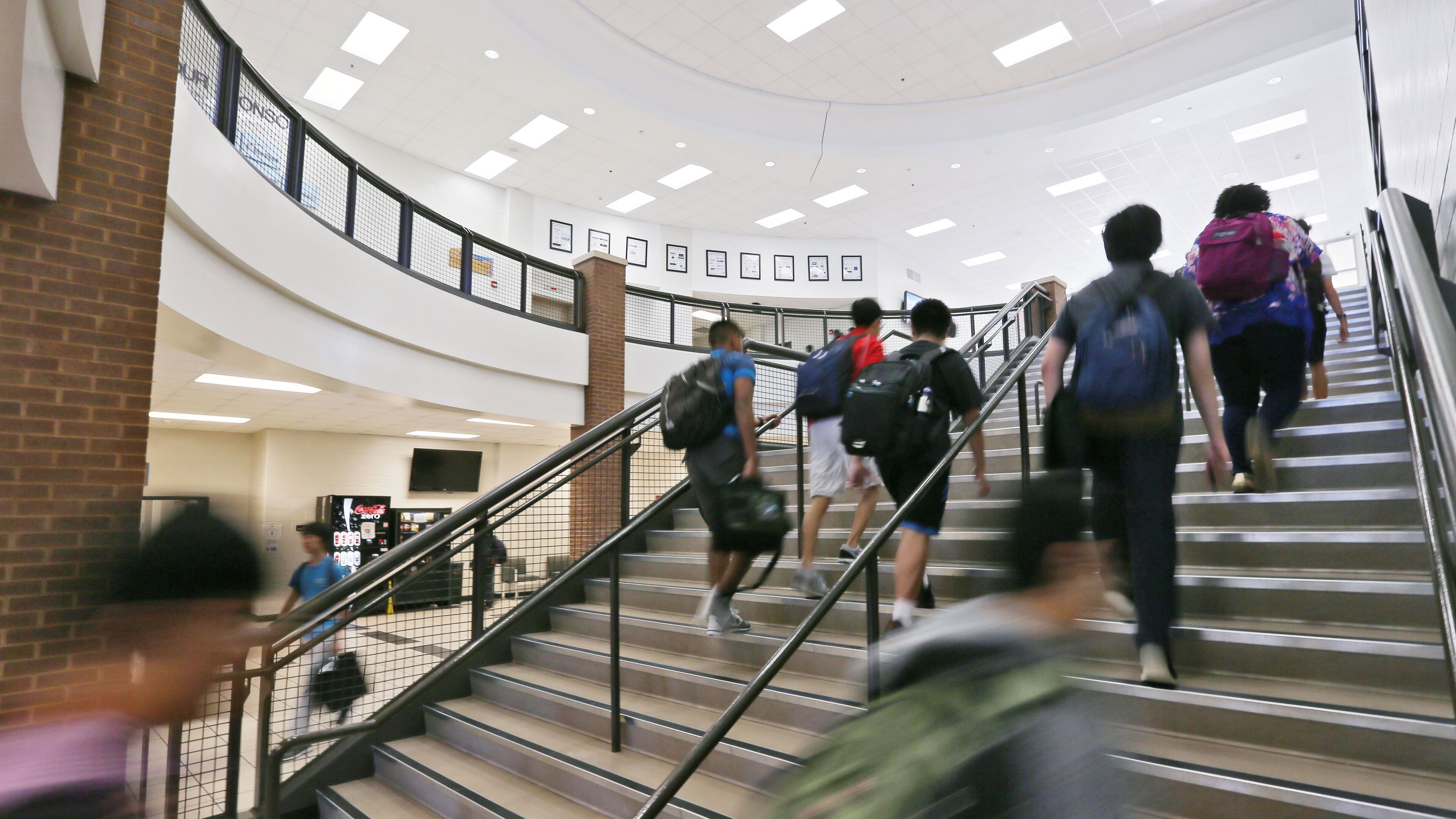 Students change classrooms at the Gwinnett School of Mathematics, Science, and Technology in Lawrenceville in September 2015. BOB ANDRES / BANDRES@AJC.COM