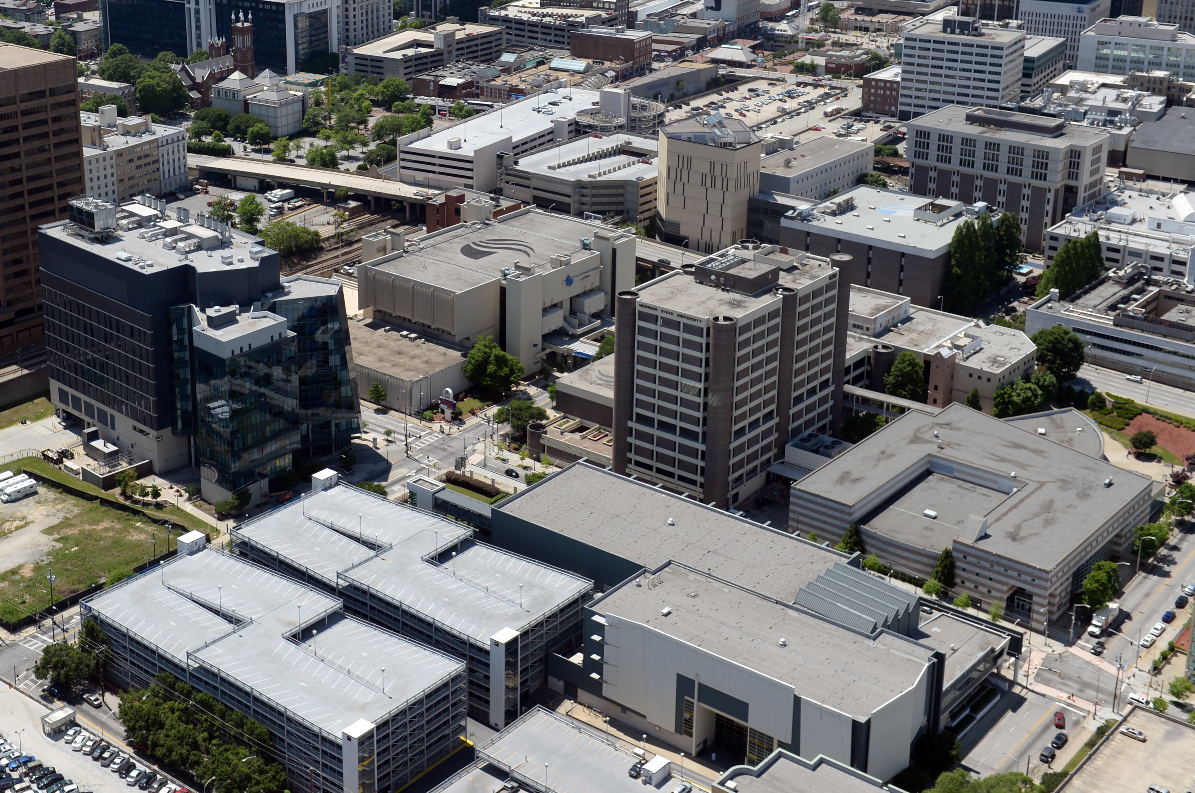 This photo is an overhead shot of downtown Atlanta and some GSU campus buildings. In an interview with AJC reporters and editors, Georgia State University's President, Mark Becker, and the development team, outlined the vision they have for the project.