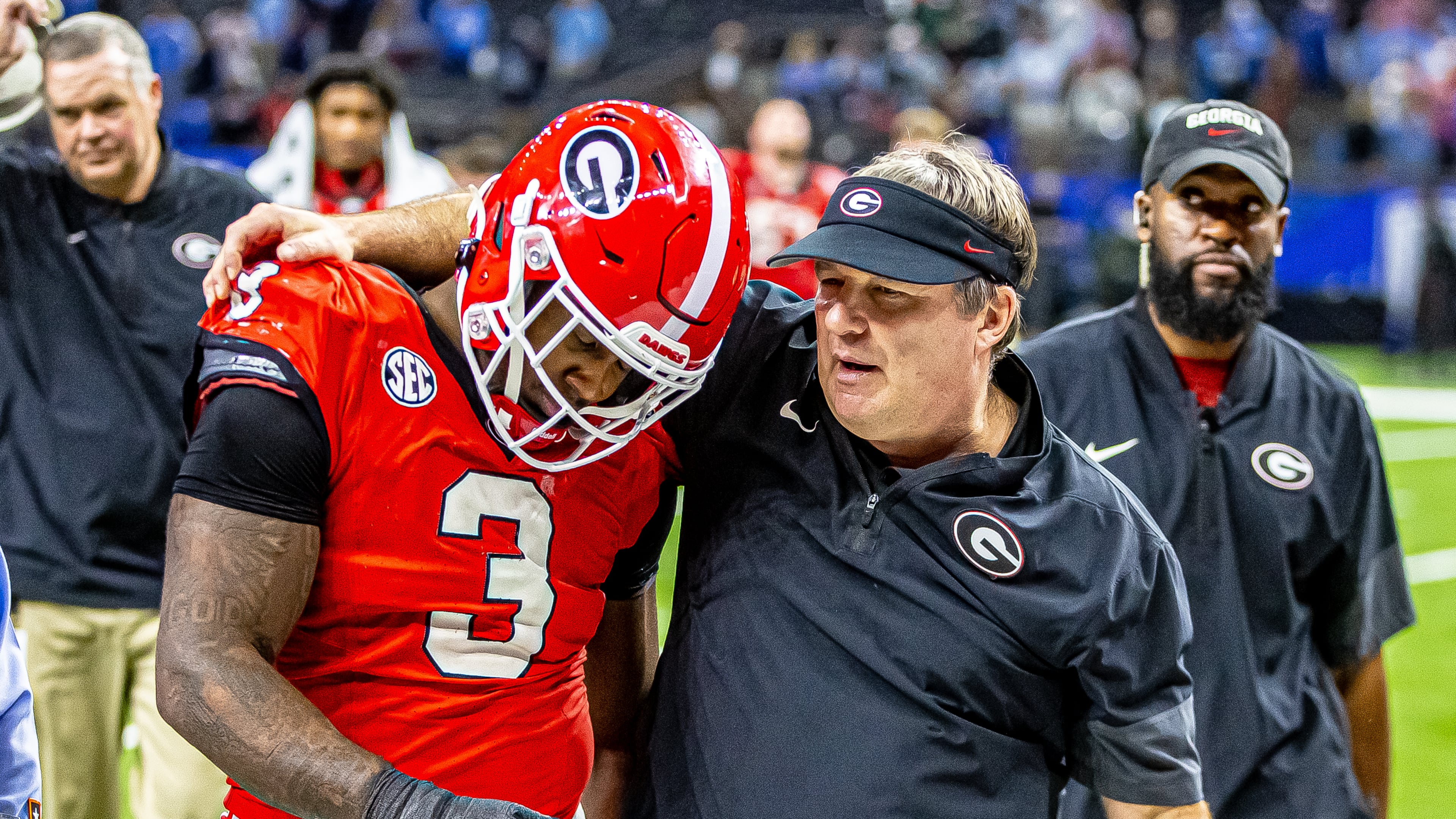 Georgia coach Kirby Smart consoles junior linebacker CJ Allen after the Bulldogs fell 39-34 to Ole Miss in a college football quarterfinal playoff game on January 1, 2026, at the Caesar's Superdome in New Orleans, Louisiana. (Jeff Sentell/DawgNation)