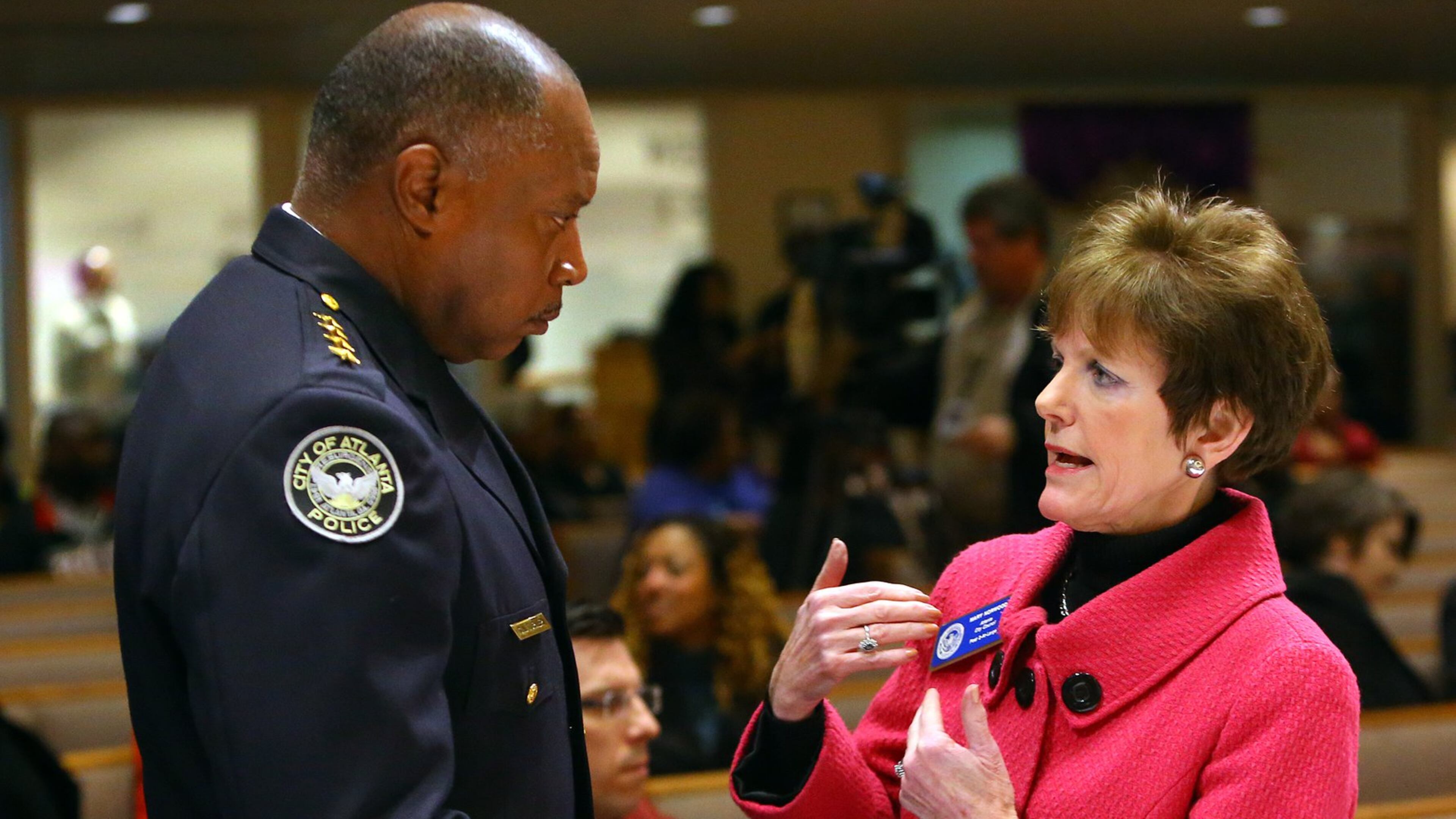 Atlanta City Councilwoman Mary Norwood, right, speaks with retiring Atlanta Police Chief Georgia Turner in this 2014 file photo. CURTIS COMPTON / CCOMPTON@AJC.COM