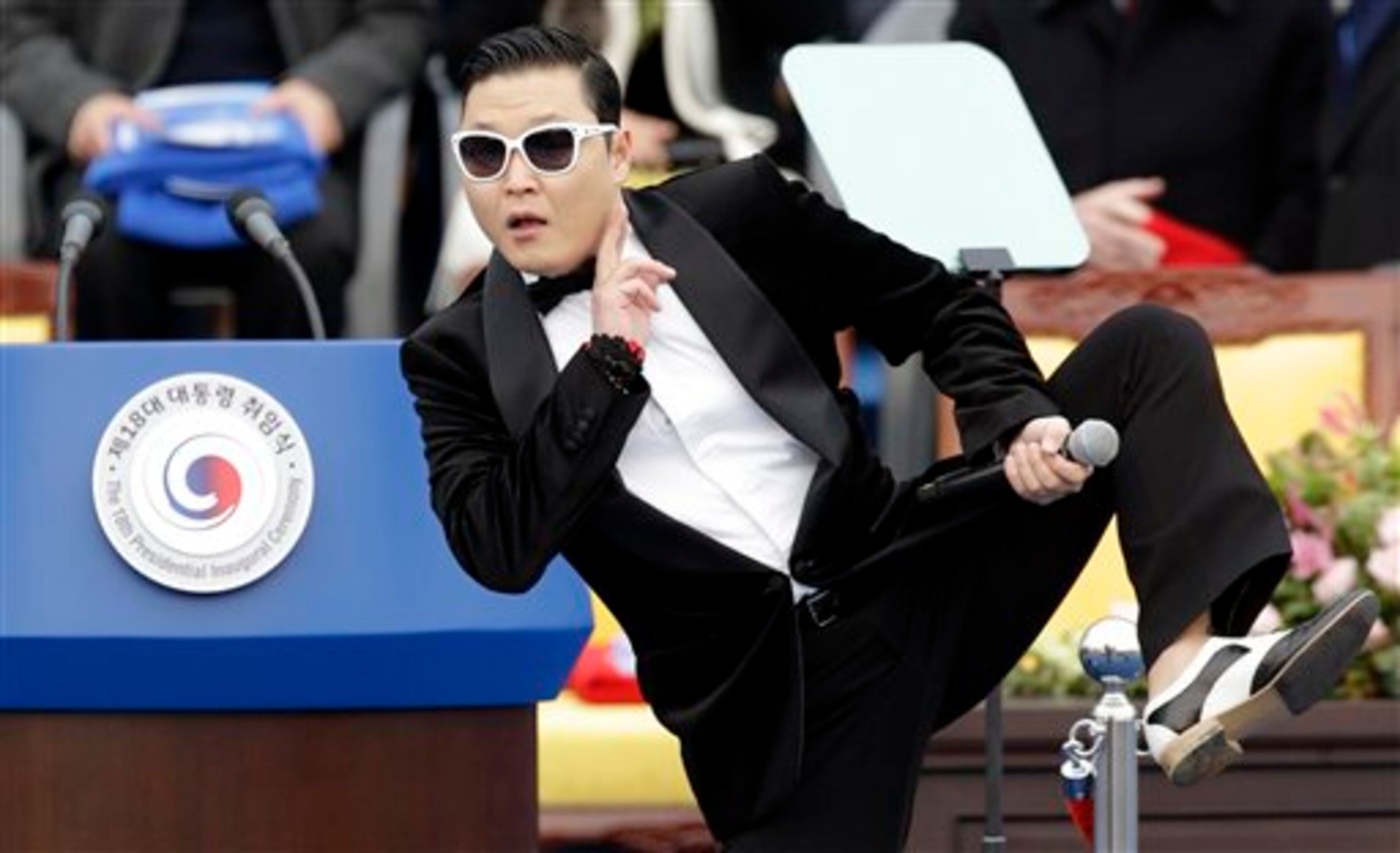 South Korean rapper PSY performs before President Park Geun-hye's presidential inauguration ceremony at the National Assembly in Seoul, South Korea, Monday, Feb. 25, 2013. Park became South Korea's first female president Monday, returning to the presidential mansion where she grew up with her dictator father. (AP Photo/Lee Jin-man)