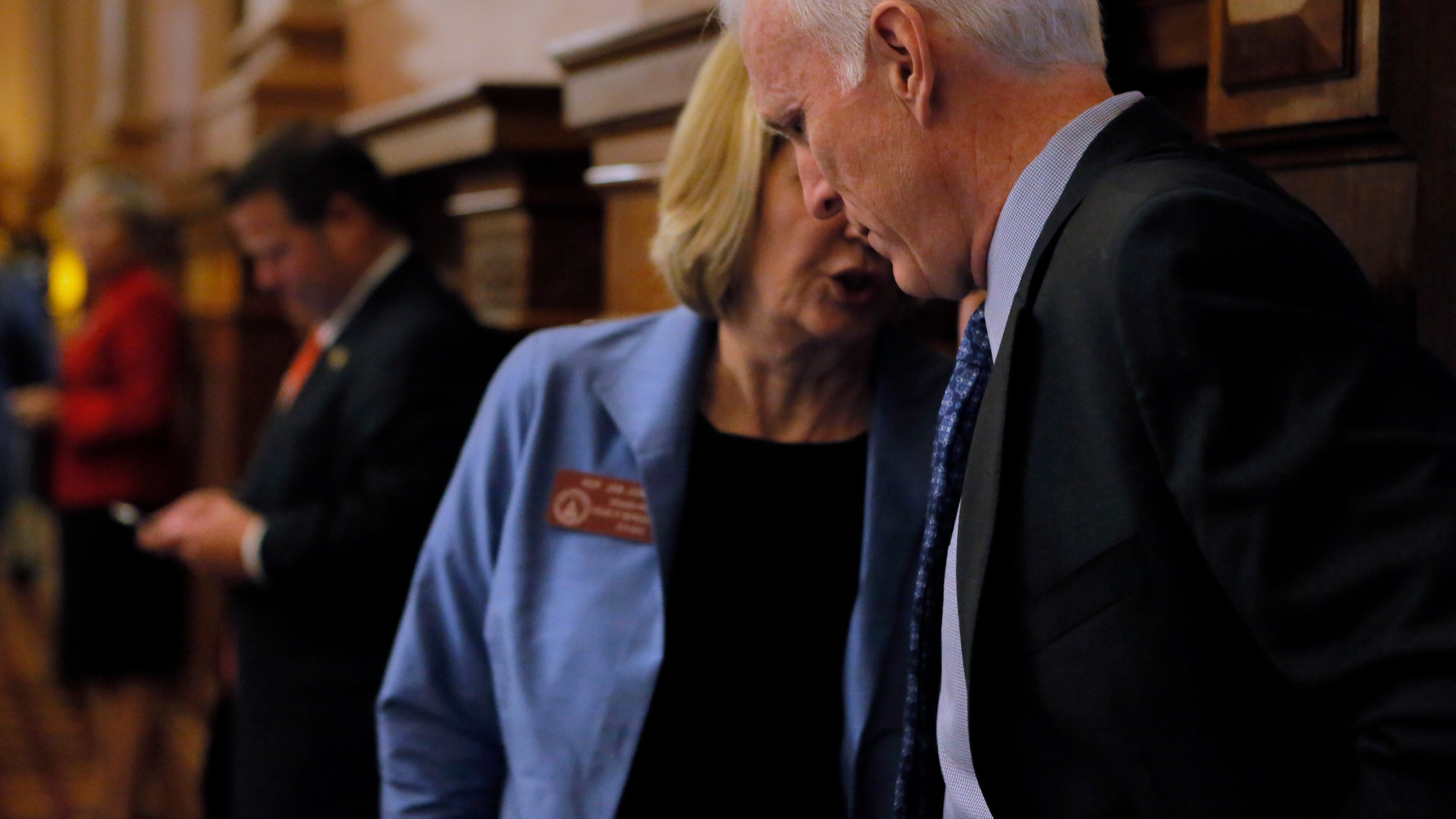 Bob Gray, one of 11 candidates in the Sixth District congressional race, talks with Speaker pro tem Jan Jones, R-Johns Creek, on the floor of the House on Wednesday. Bob Andres, bandres@ajc.com