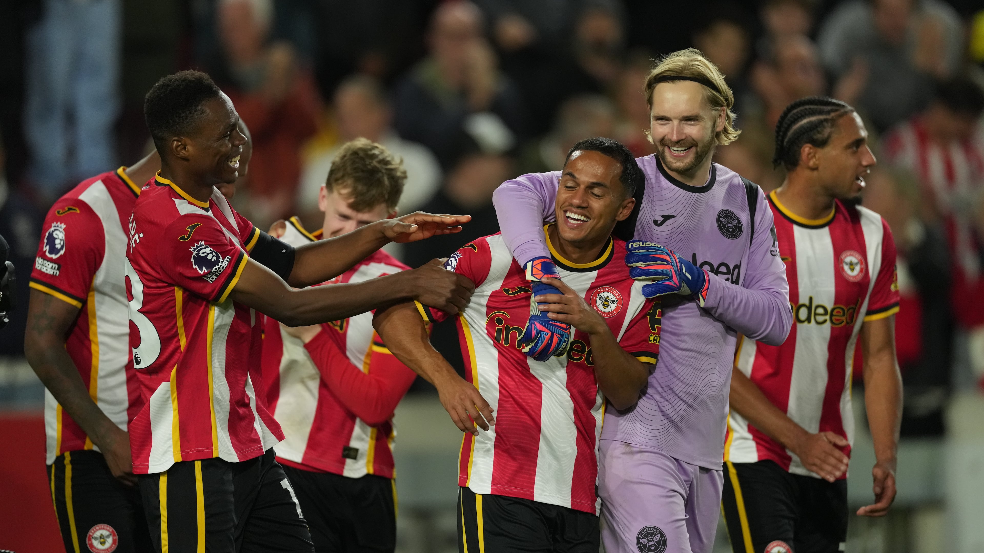 Brentford players celebrate after the Premier League soccer match between Brentford and Chelsea in London, England, Friday, Sept. 18, 2026. (AP Photo/Dave Shopland)