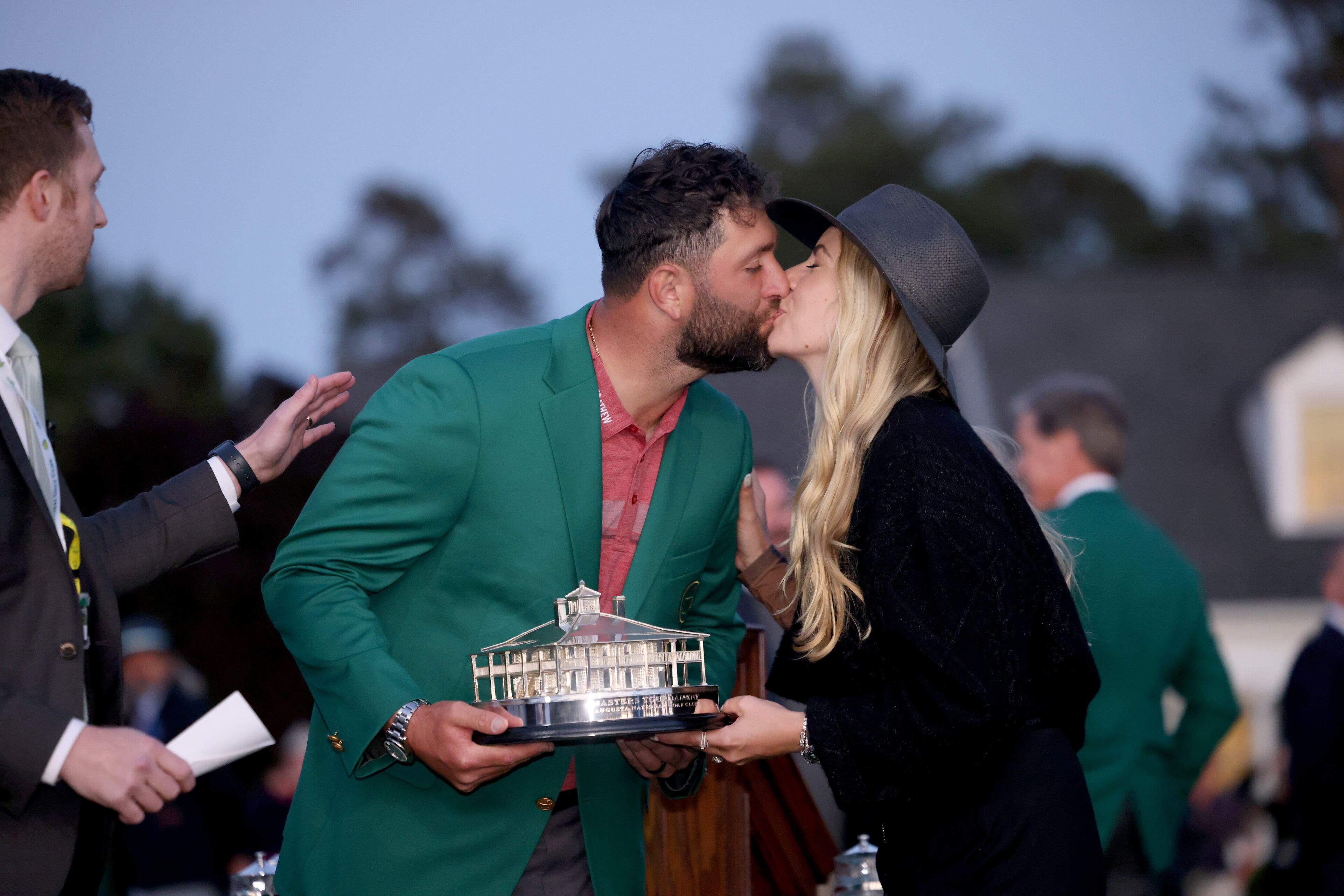 Jon Rahm celebrates with his wife Kelley Cahill at the 2023 Masters Tournament at Augusta National Golf Club, Sunday, April 9 2023, in Augusta, Ga. (Jason Getz / Jason.Getz@ajc.com)
