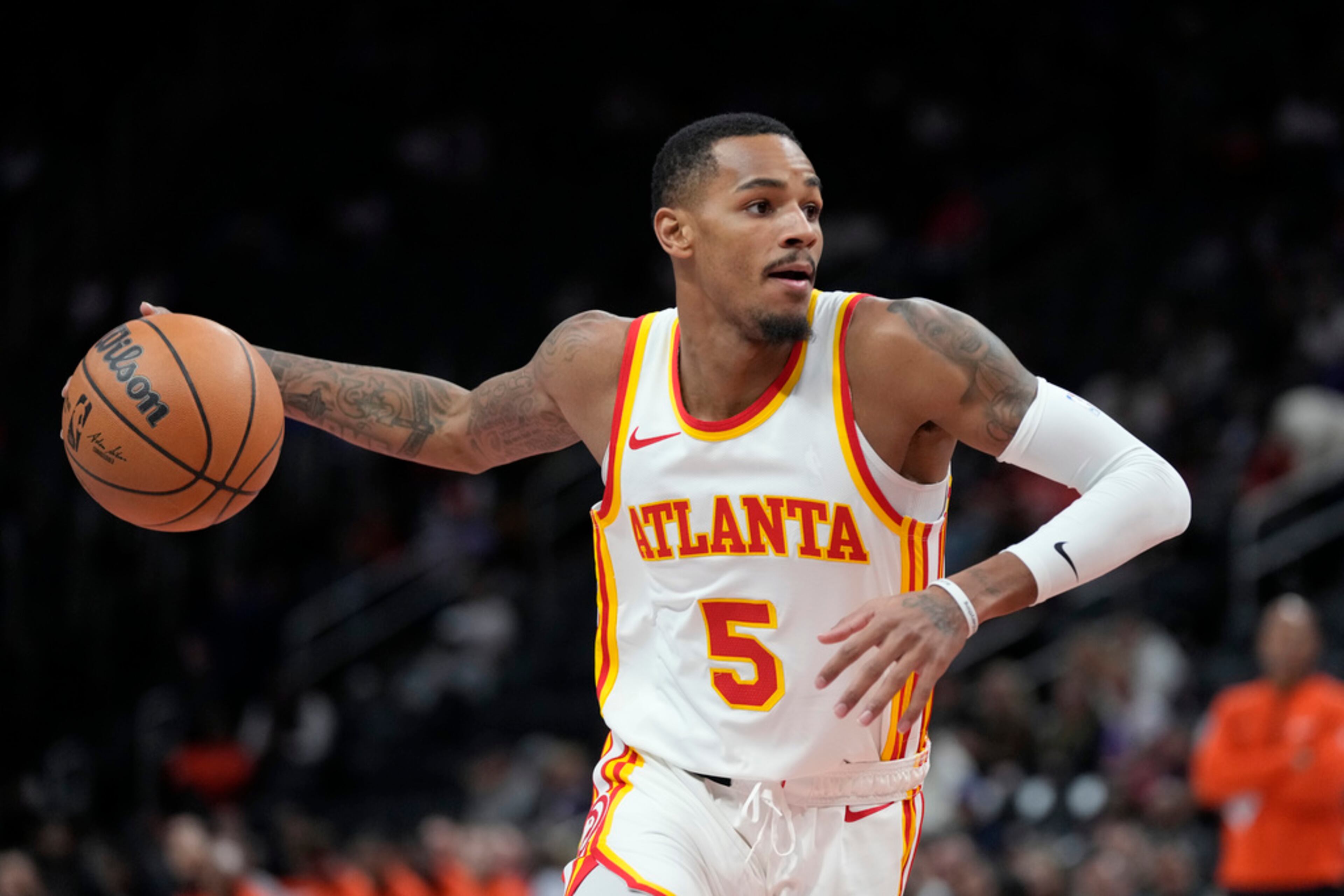 Atlanta Hawks guard Dejounte Murray drives during the first half of an NBA basketball game against the Detroit Pistons, Tuesday, Nov. 14, 2023, in Detroit. (AP Photo/Carlos Osorio)