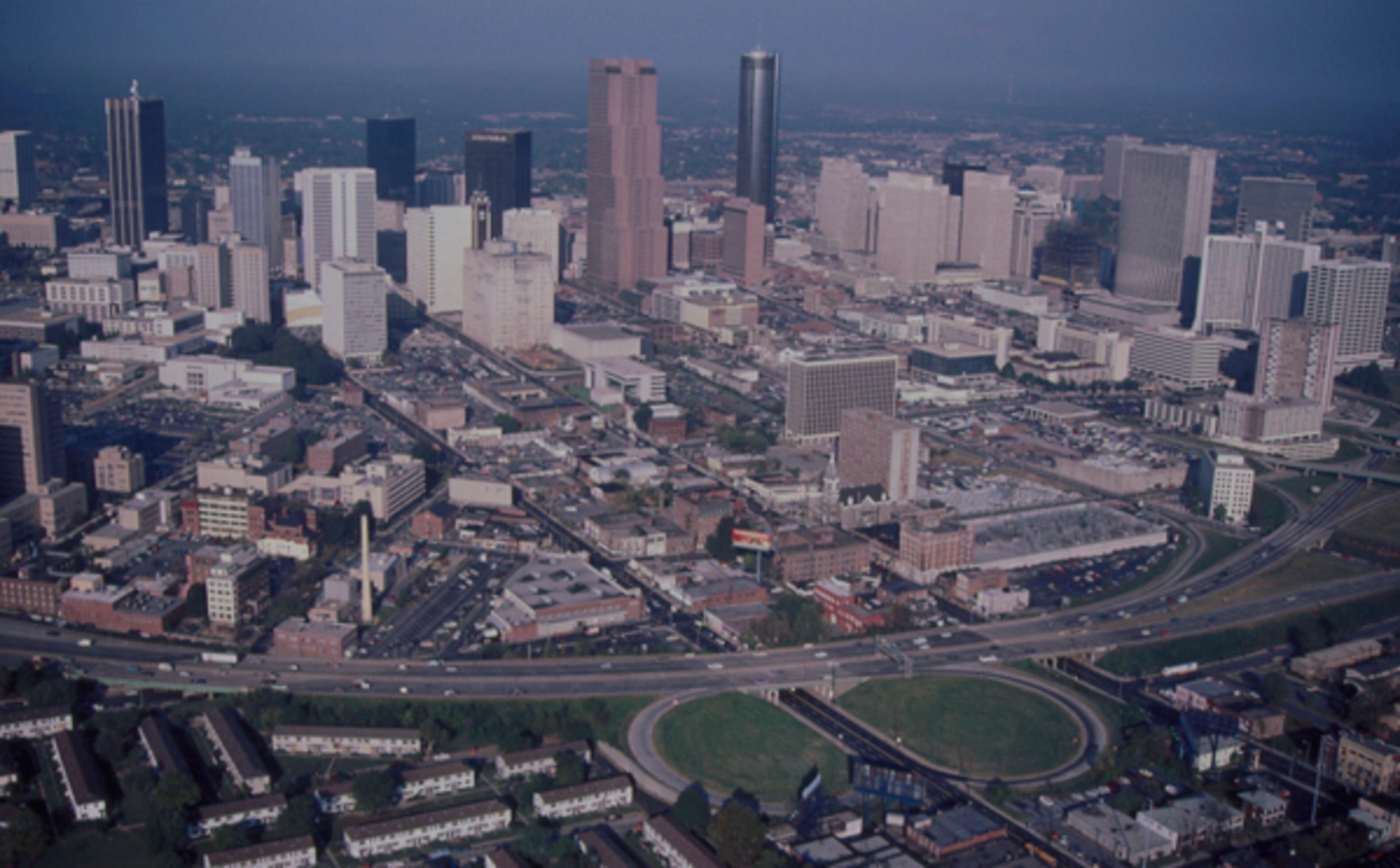 The construction of the Downtown Connector divided downtown Atlanta from the historic Sweet Auburn neighborhood (at the bottom of the photo), which was the cultural and business center for African Americans in Atlanta. Photo by Cotten Alston, Courtesy of Kenan Research Center at the Atlanta History Center.