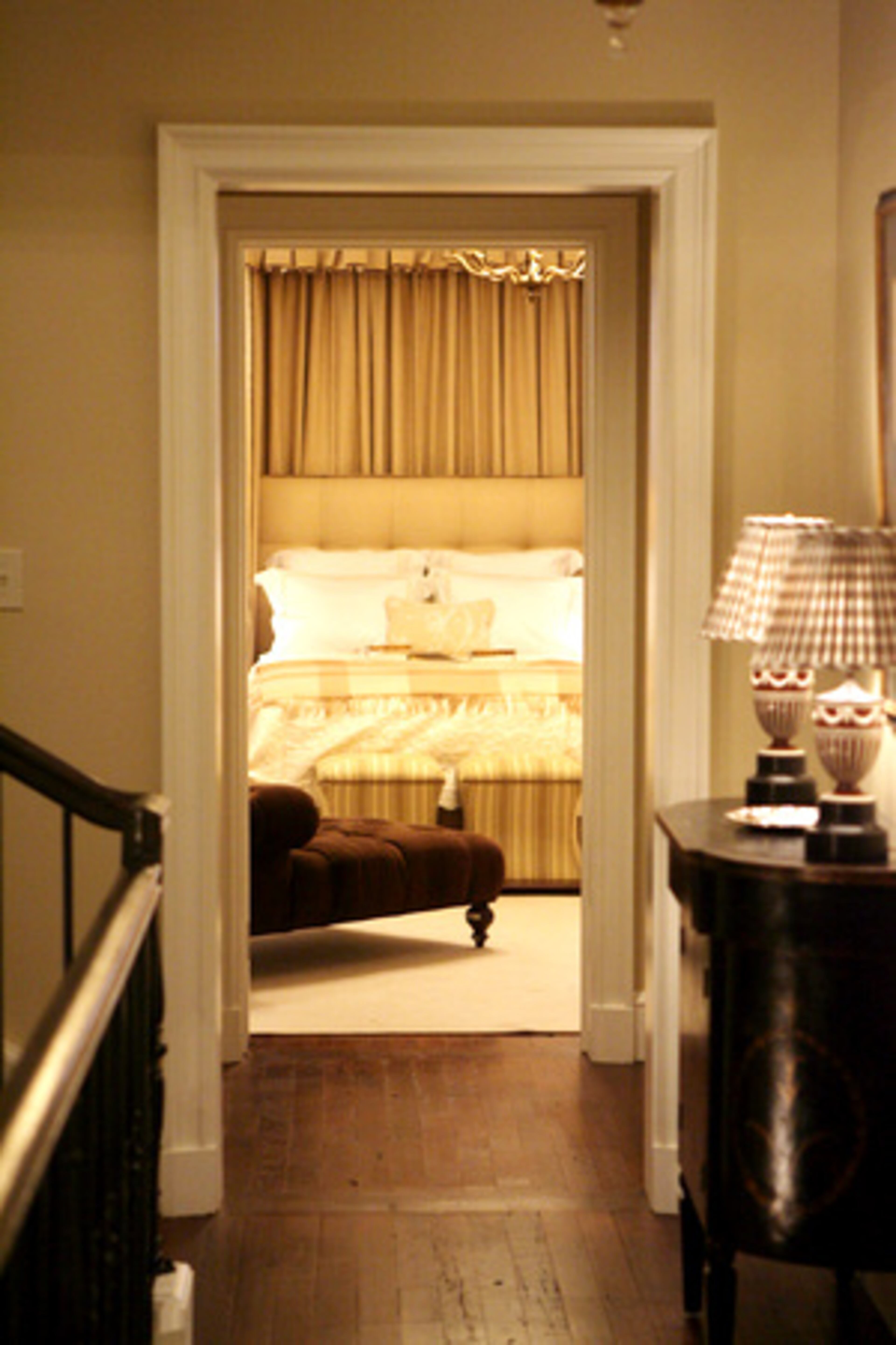 A view of the master bedroom from the hallway.