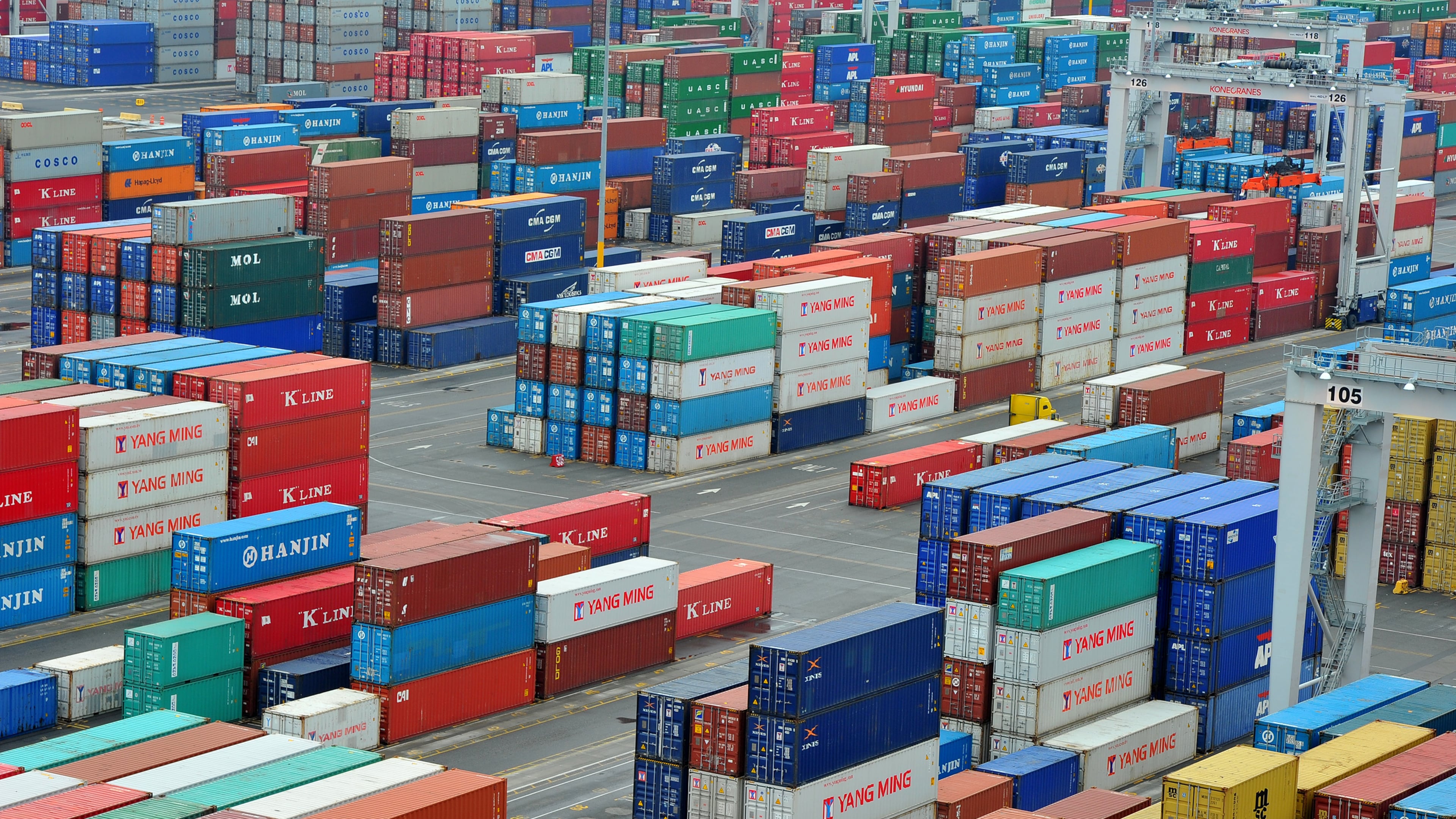 Containers are piled high at the Port of Savannah. More than $17 billion in goods comes into Georgia each year and across-the-board tariffs could raise prices of those shipments. (AJC 2012)