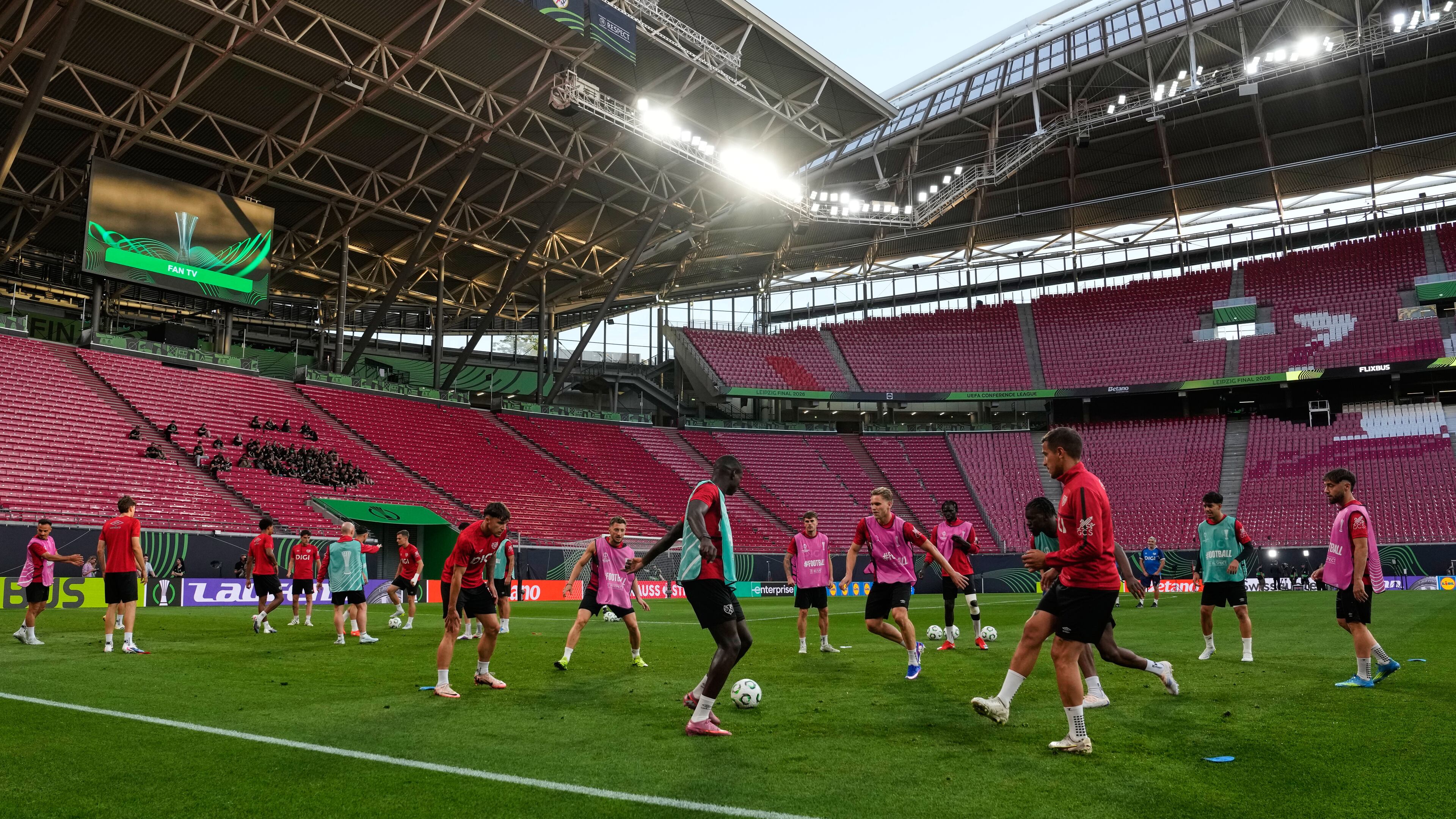 Rayo's players work out during a training session ahead of the Europa Conference League final soccer match between Crystal Palace and Rayo Vallecano in Leipzig, Germany, Tuesday, May 26, 2026. (AP Photo/Michael Probst)