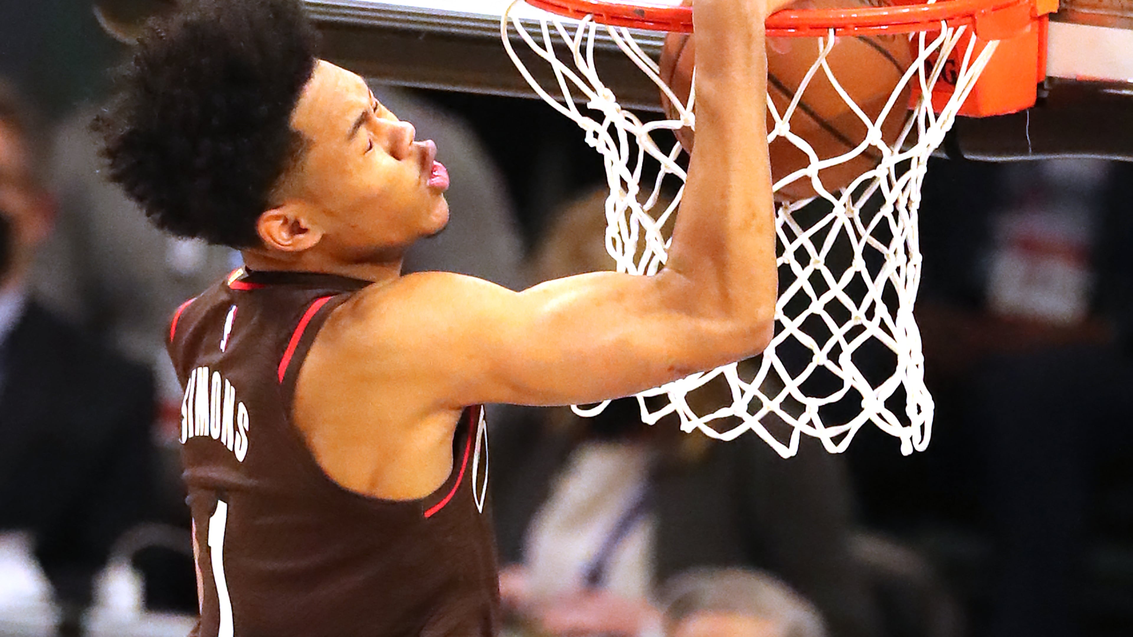 Anfernee Simons of the Portland Trail Blazers slams it home to win the Slam Dunk contest during halftime of the NBA All-Star Game Sunday, March 7, 2021, at State Farm Arena in Atlanta. (Curtis Compton / Curtis.Compton@ajc.com)
