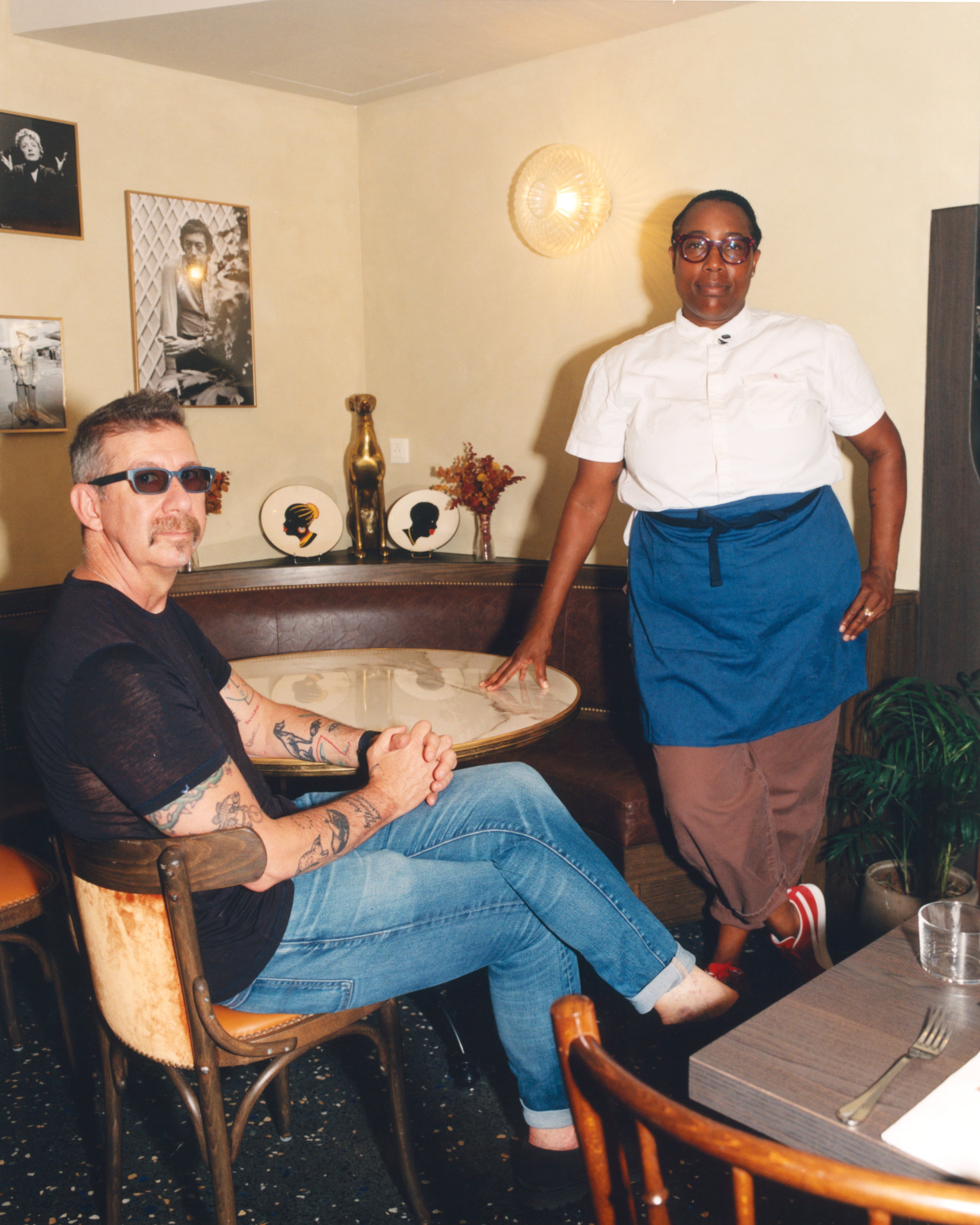 Restaurateur Johno Morisano (left) and chef Mashama Bailey in the dining room of L'Arret by The Grey in Paris. The business partners founded The Grey in Savannah and formed a culinary partnership with the forthcoming Signia Hilton Savannah. (Credit: Kelly Anthony-Koffi and Semaine, courtesy of Signia Hilton Savannah)