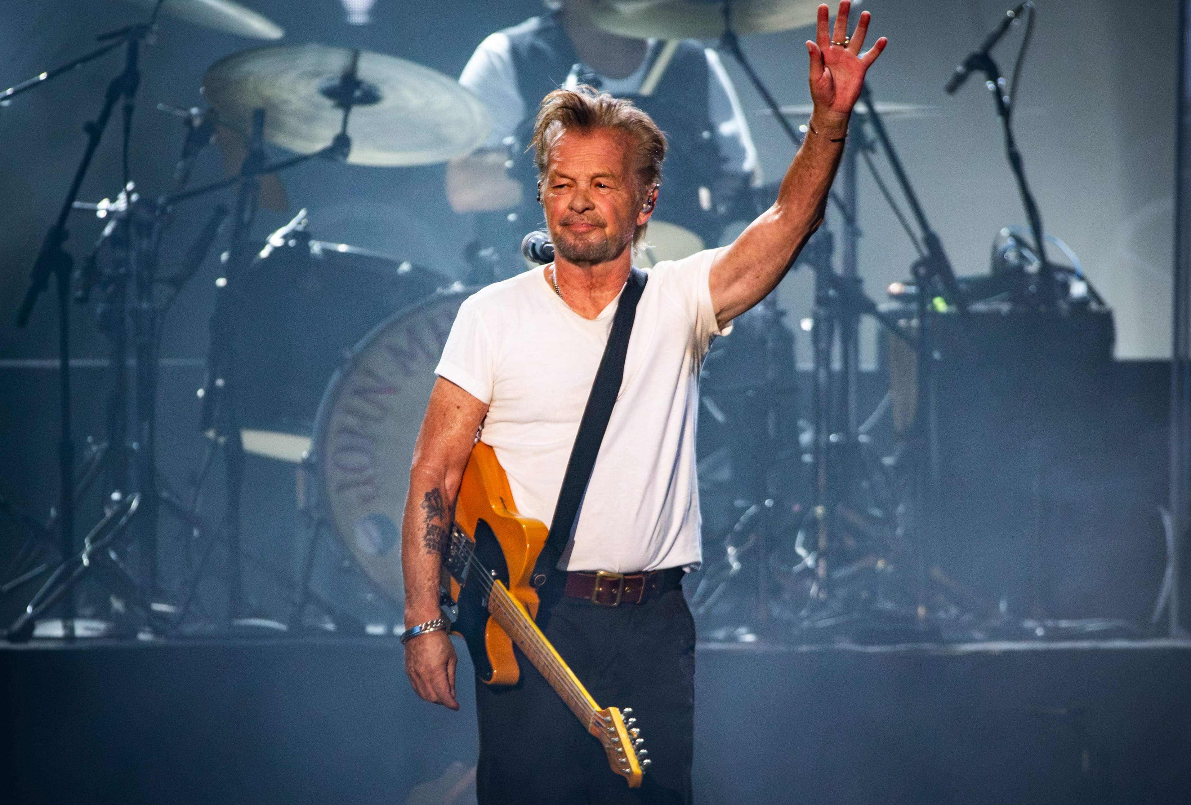 Alpharetta. GA: John Mellencamp visited America Bank Amphitheatre on his Dancing Words tour Saturday night. Running through two acts, with a 15 minute intermission, Mellencamp played nearly forty songs to a sing-along crowd. Photo taken Thursday August 1, 2026 at Ameris Bank Amphitheatre. Mellencamp (RYAN FLEISHER FOR THE ATLANTA JOURNAL-CONSTITUTION)
