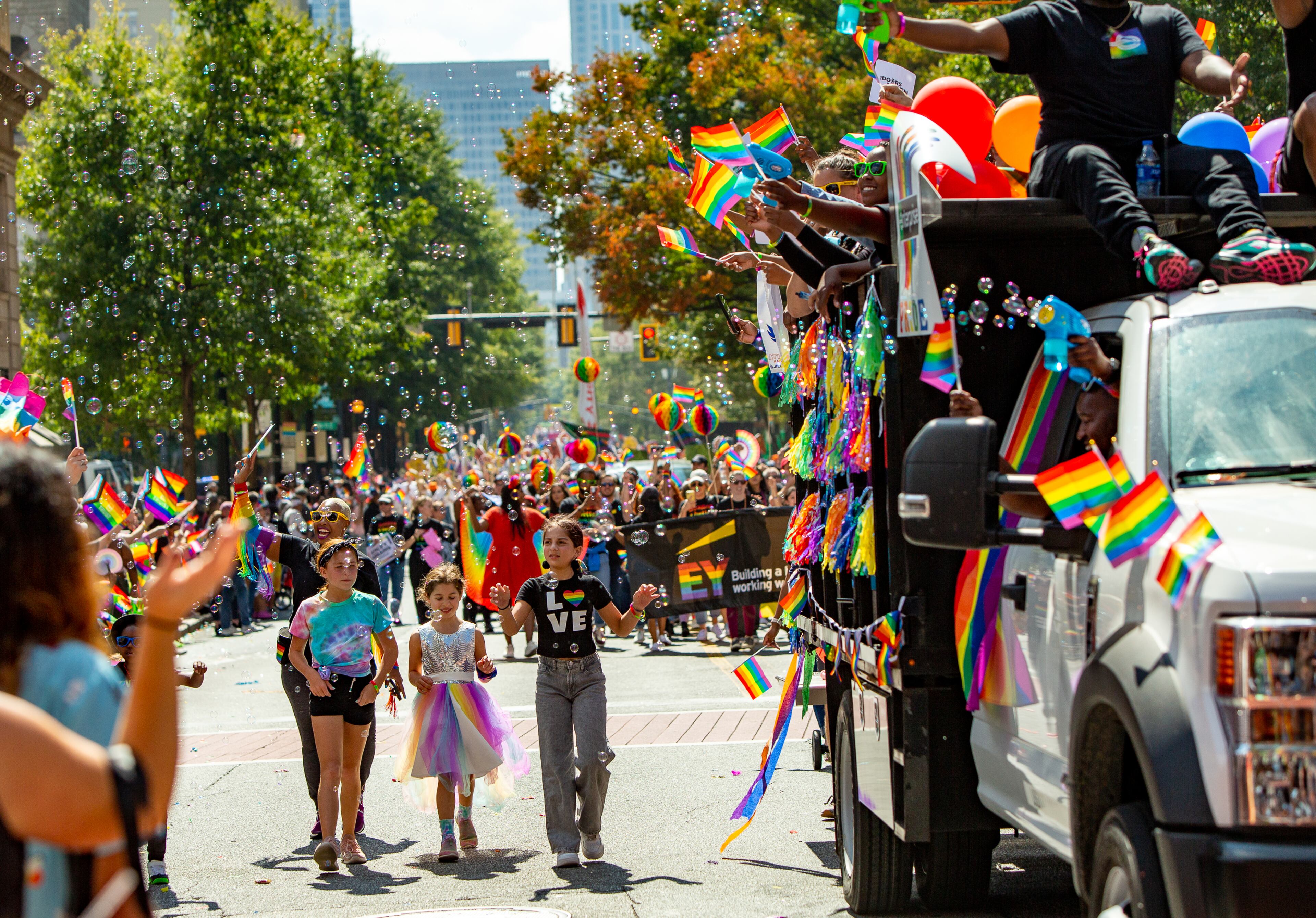 The Atlanta Pride Parade heads down Peachtree Street to 10th Street ending in Piedmont Park on Sunday, Oct. 9, 2022. (Photo: Jenni Girtman for The Atlanta Journal-Constitution)