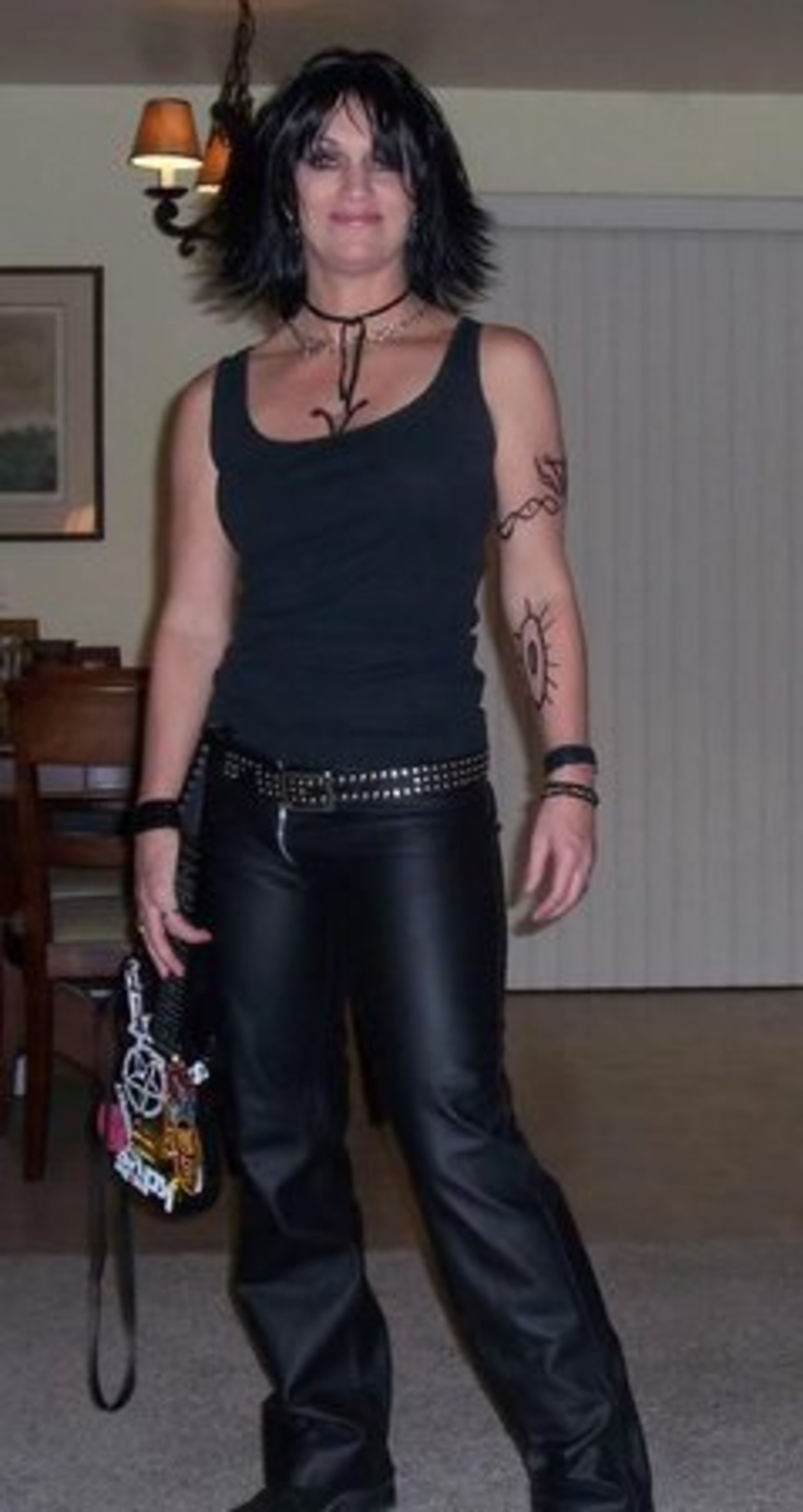 JOAN JETT: If you found the rock-and-roll biopic "The Runaways" inspiring, then rock out this Halloween as Joan Jett. Grab some leather pants (vinyl will do for those on a budget). The color scheme is simple, all black. If you don't already sport tattoos, apply a couple of temporary ones. Cocky swagger and singing ability are optional, but appreciated.