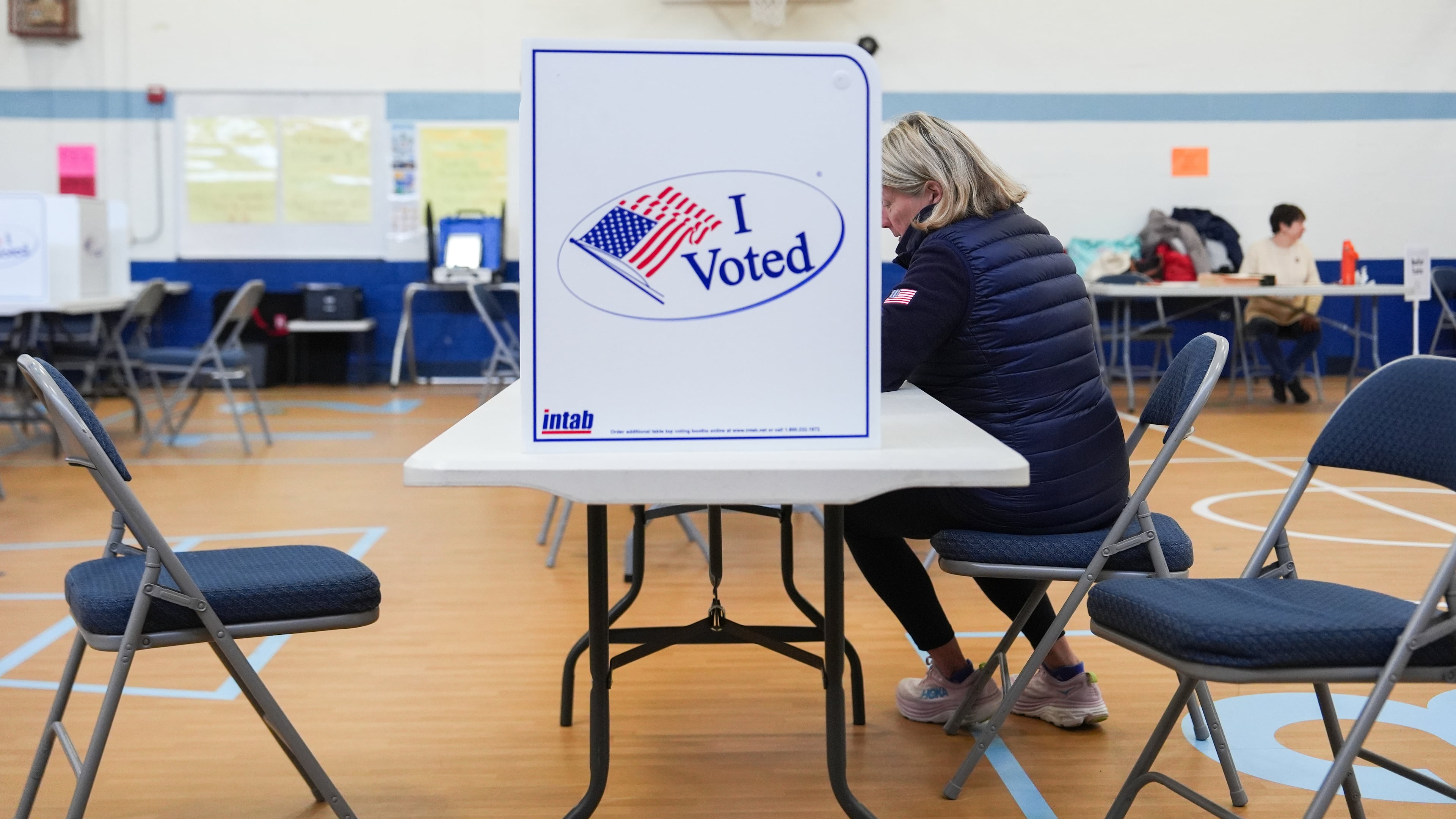 A person votes in the Virginia redistricting referendum at Lyles-Crouch Traditional Academy, Tuesday, April 21, 2026, in Alexandria, Va. (AP Photo/Julia Demaree Nikhinson)