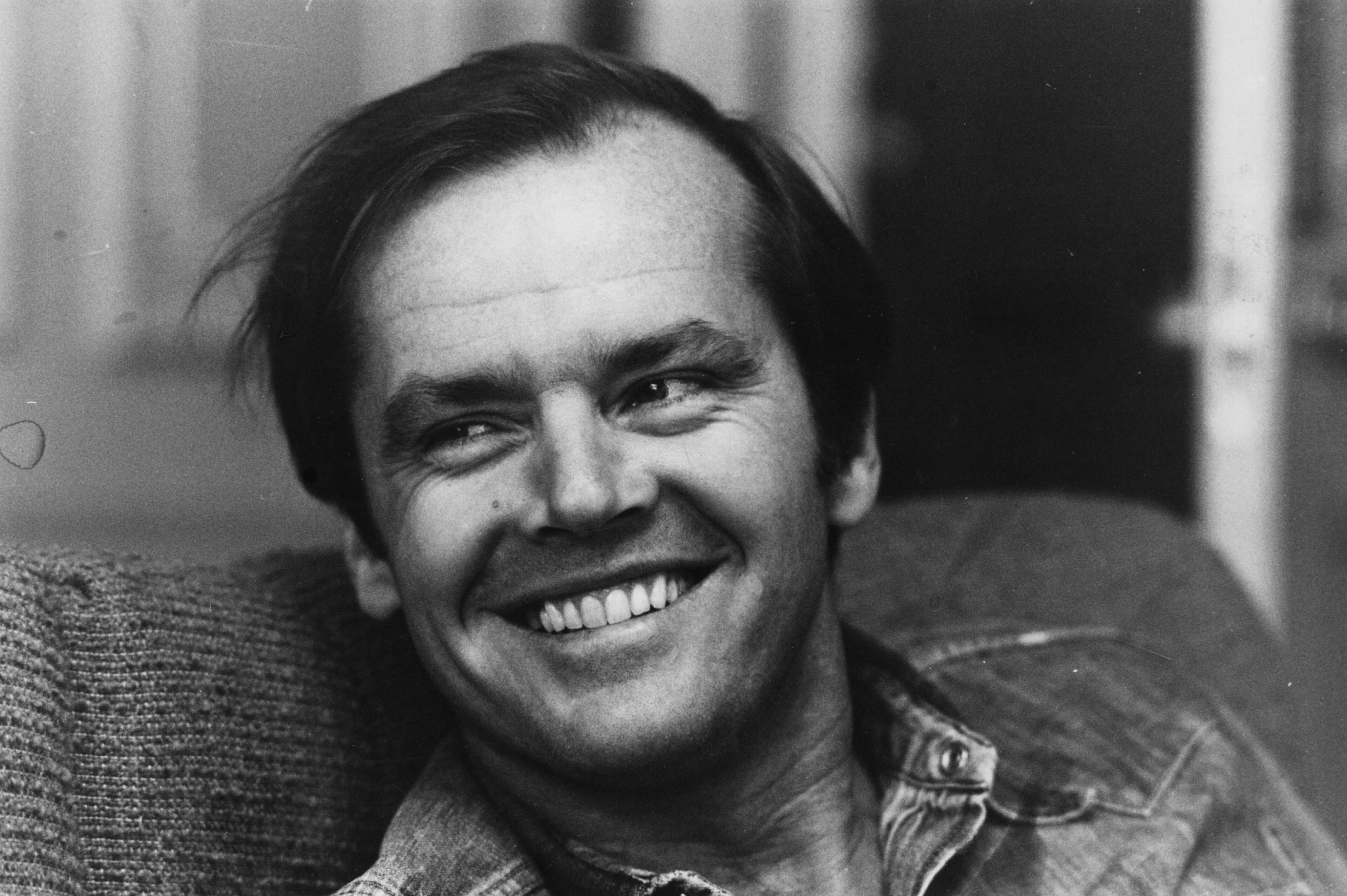 American actor Jack Nicholson smiles at the camera (1974).