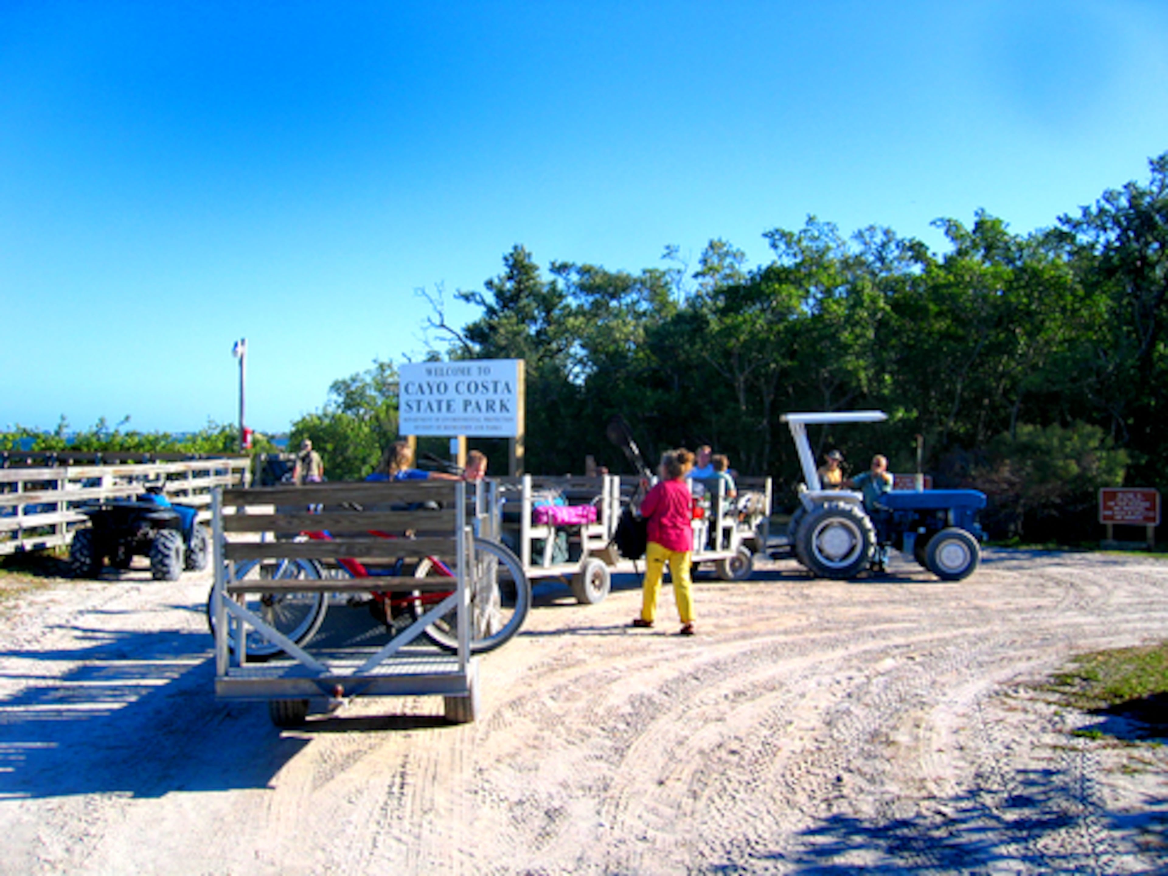Campers put their gear on the park tram after arriving by ferry from Pine Island. The tram transports visitors to the beach and camping site near the Gulf of Mexico.