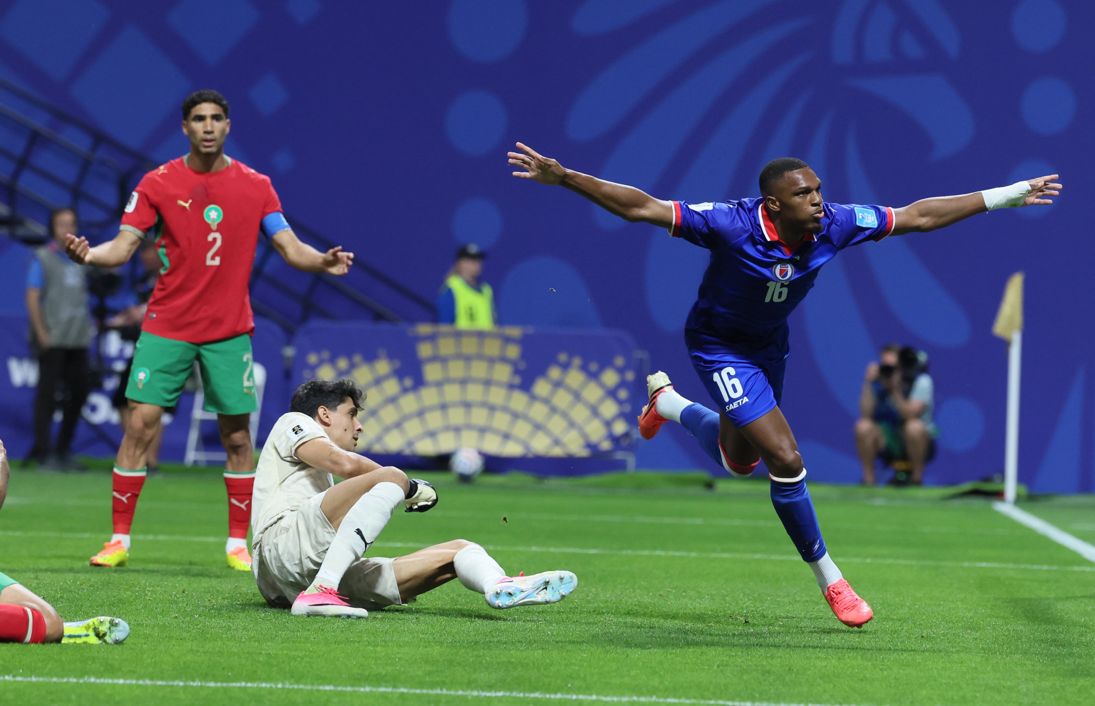 Haiti's Lenny Joseph, right, scores his team's first goal in the World Cup and first in 52 years, past Morocco goalkeeper Yassine Bounou and Morocco's Achraf Hakimi, left during first half of Morocco vs. Haiti Group C FIFA World Cup match at Atlanta Stadium (Mercedes-Benz Stadium) on Wednesday, June 24, 2026. (Jason Getz/AJC)