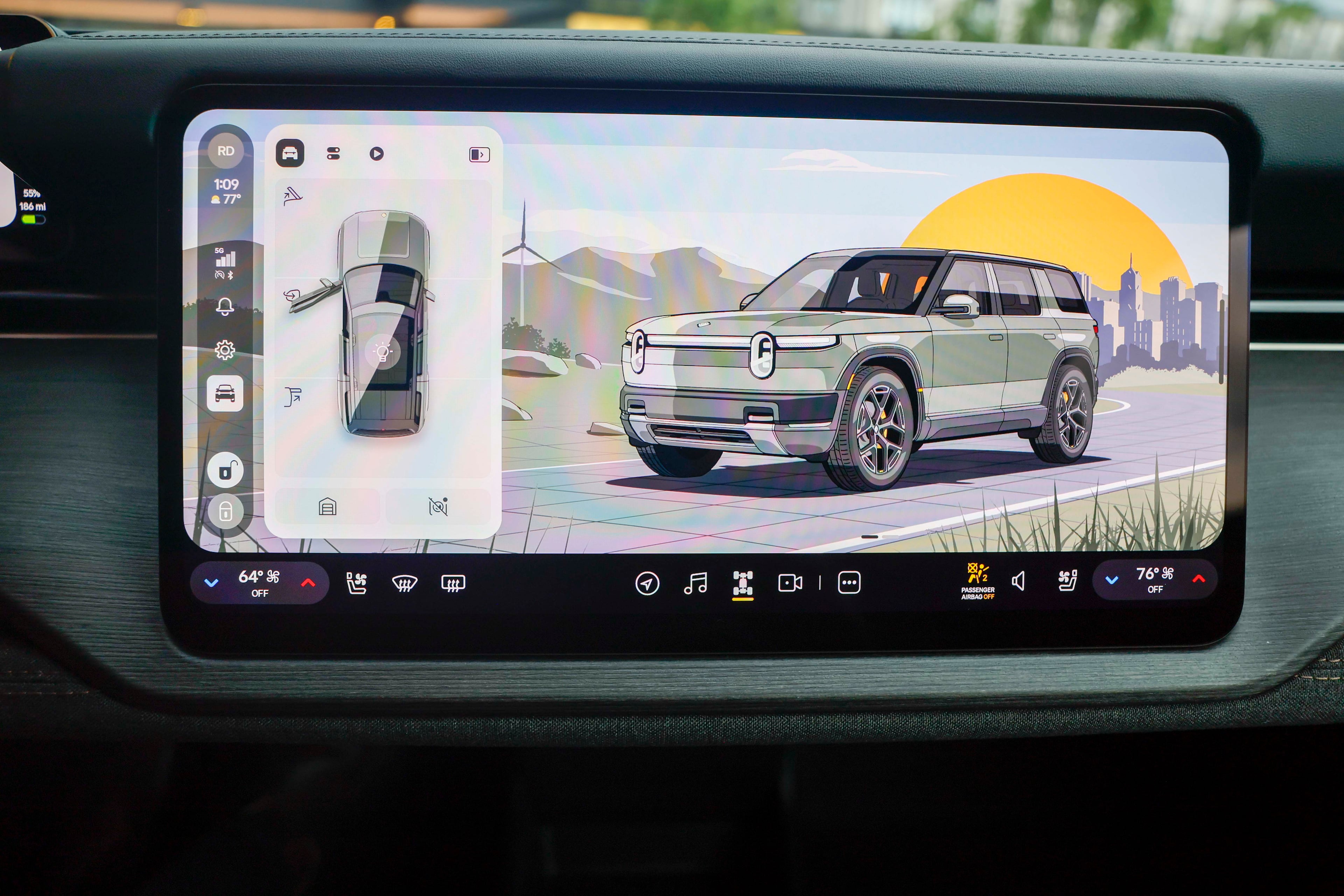 A digital dashboard of a Rivian R2 model is displayed at Rivian’s East Coast headquarters in Atlanta. (Miguel Martinez/AJC)
