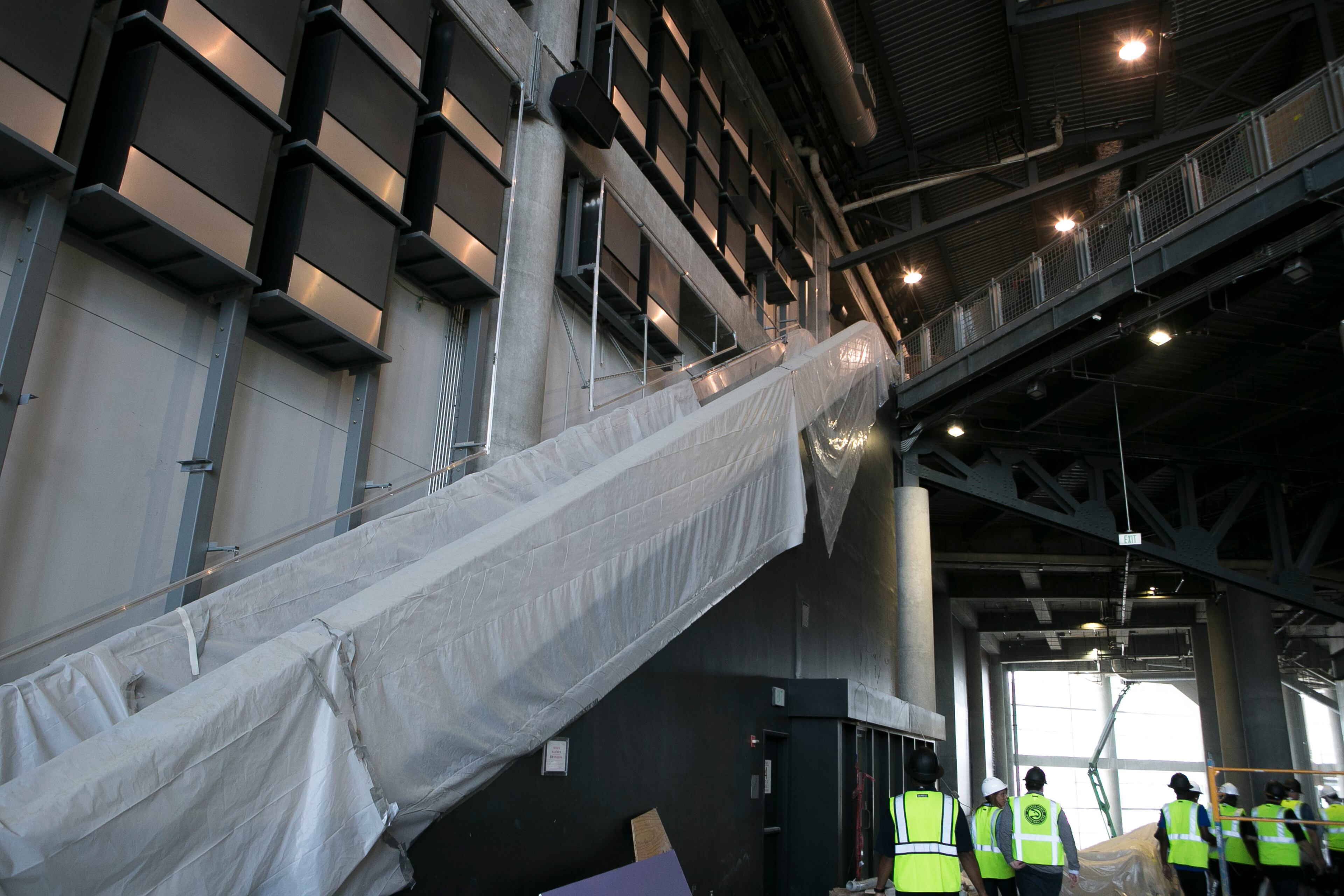 An escalator is shown during a guided media tour through the in-progress renovations at the State Farm Arena in Atlanta, Ga., on Thurs., Sept. 20, 2018. The renovations, which total $192.5 million, are on track to be completed by the arena's scheduled open house on October 20. The current rate of progress is about $1 million of work per day, according to Brett Stefansson, Atlanta Hawks executive vice president and general manager of State Farm Arena. (CASEY SYKES, CASEYLANESYKES@GMAIL.COM)