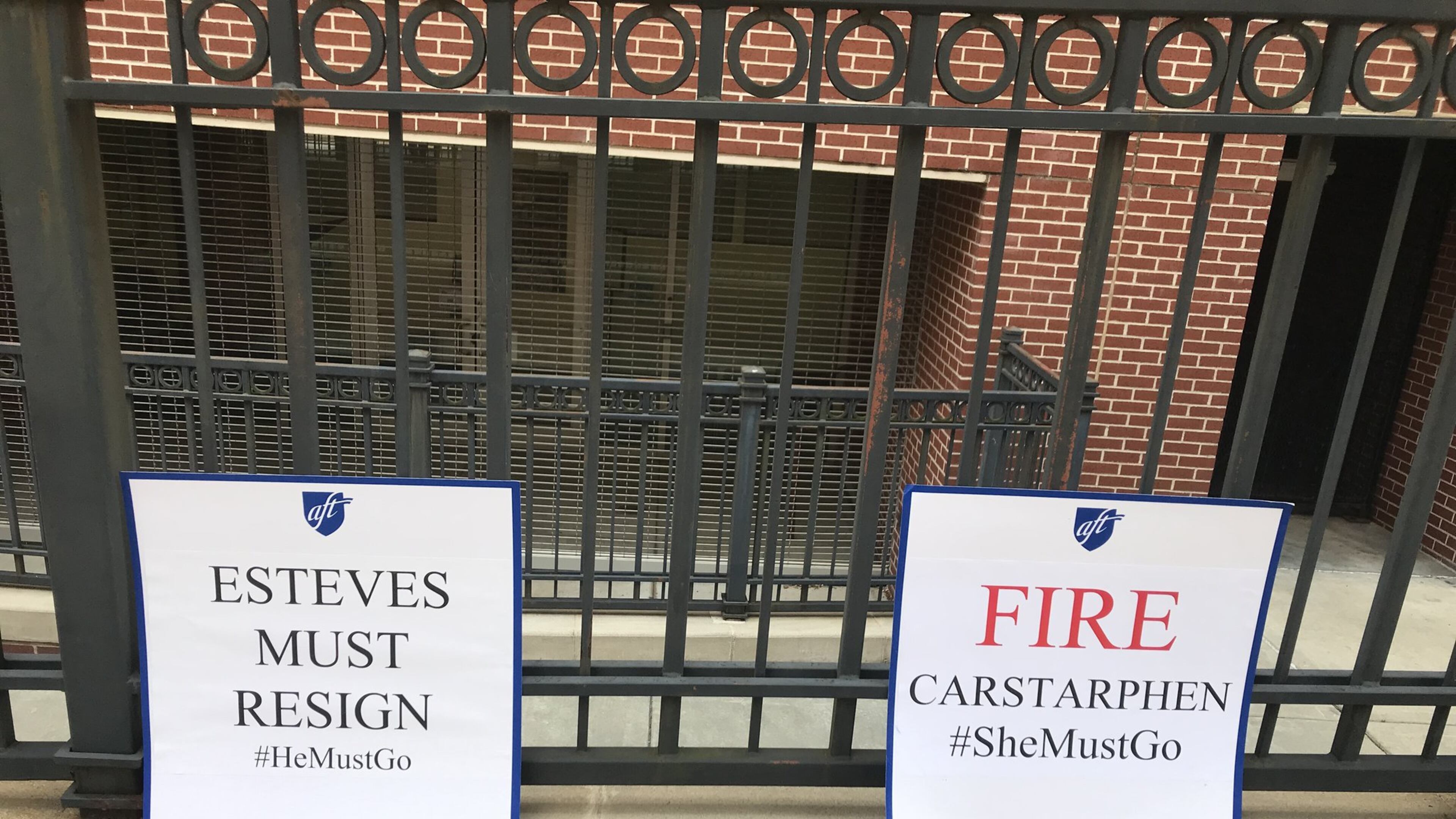 Signs displayed during an August 2019 protest call for the removal of Atlanta Public Schools Superintendent Meria Carstarphen and school board Chairman Jason Esteves. The protest was organized by the Georgia Federation of Teachers. VANESSA McCRAY/AJC