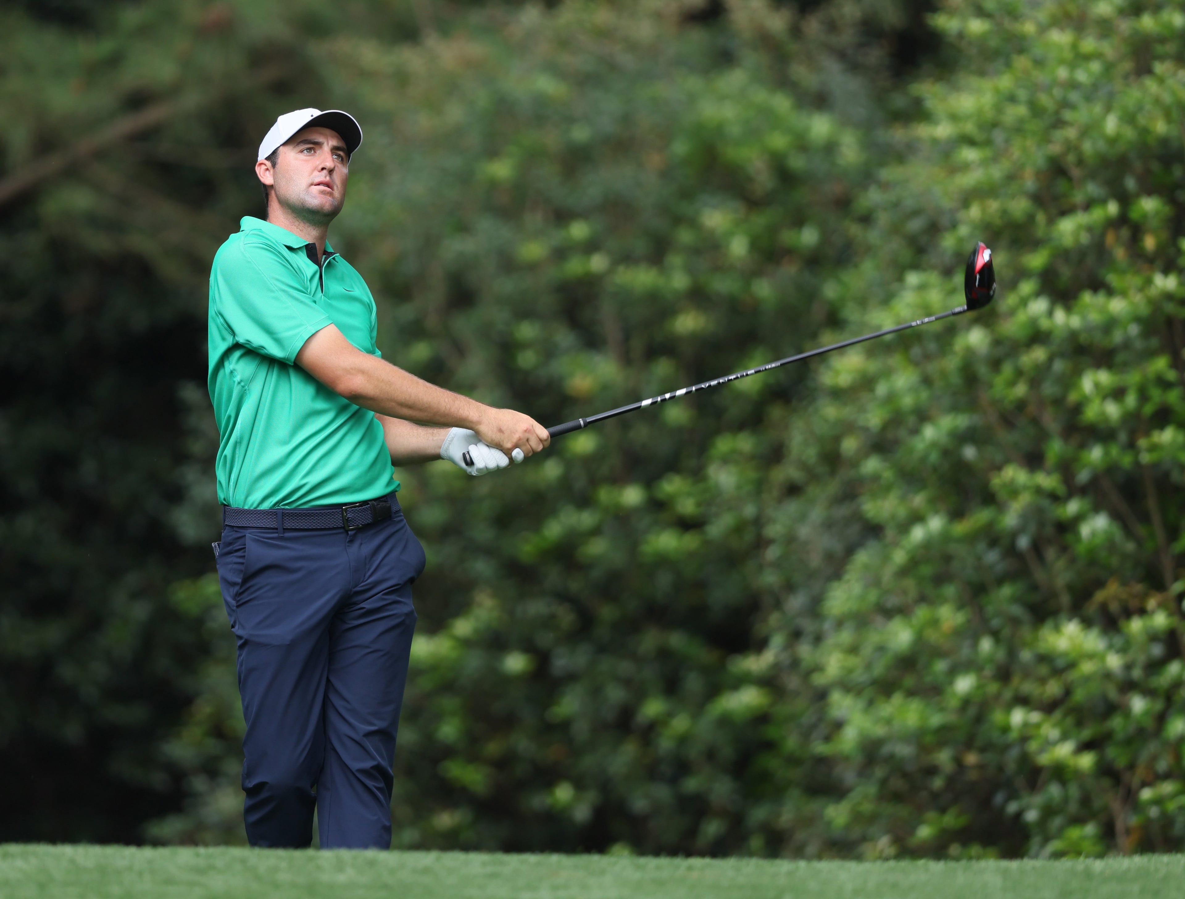 Scottie Scheffler tees off on 11th hole during first round of the 2023 Masters Tournament at Augusta National Golf Club, Thursday, April 6, 2023, in Augusta, Ga. (Jason Getz / Jason.Getz@ajc.com)