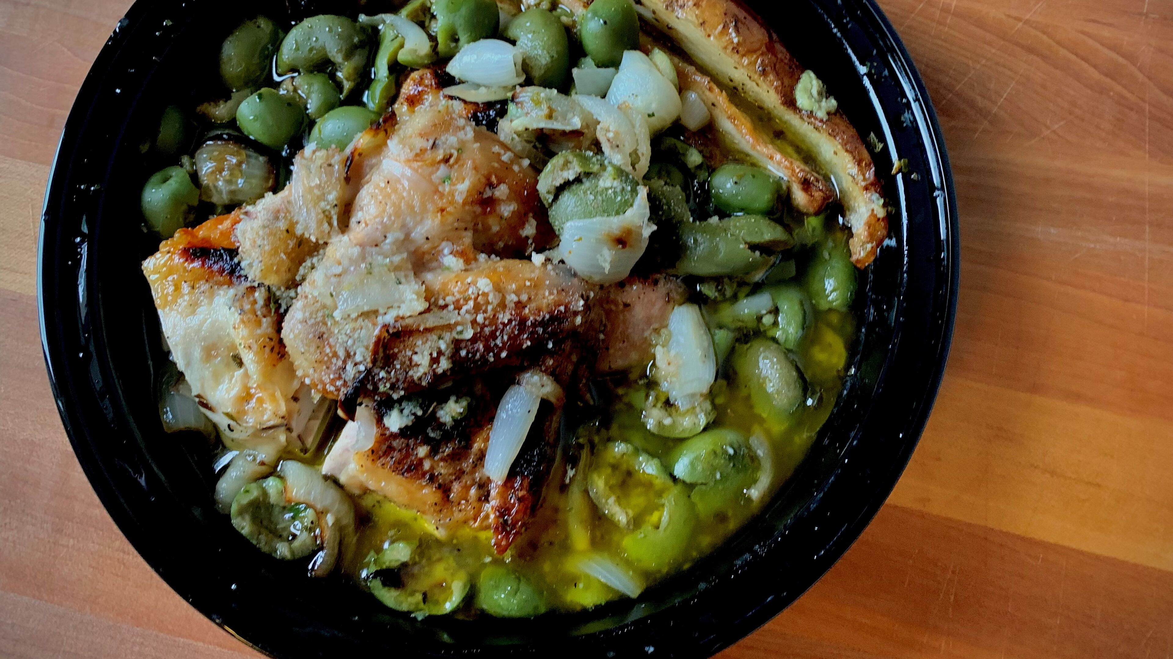 Pollo Amalfi, bedecked with roasted cipollini onions and whole olives, is a delicious choice from Gio's Chicken Amalfitano. Henri Hollis/henri.hollis@ajc.com