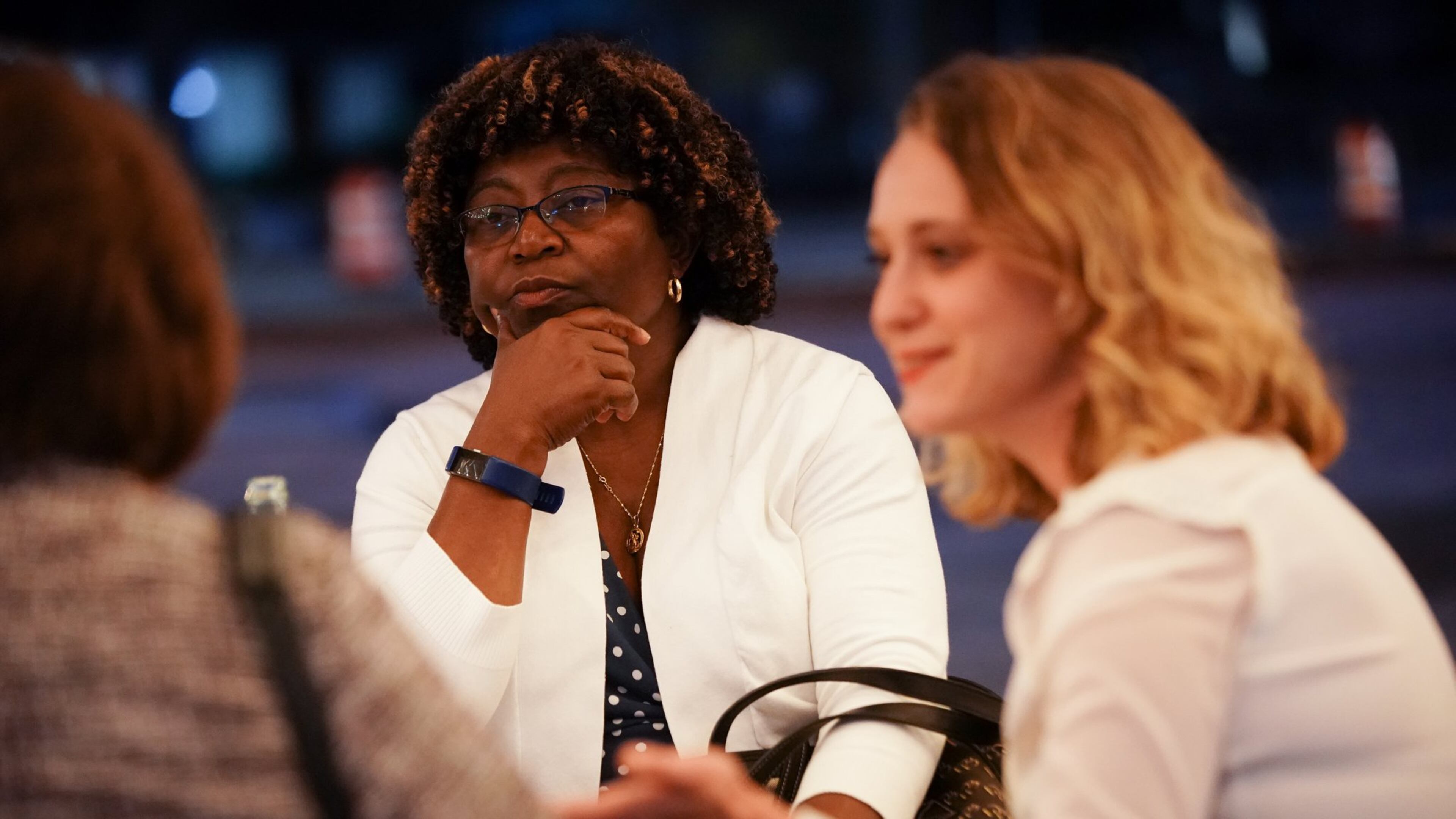 Glory Kilanko, (center), director and CEO of Women Watch Afrika, attends a pep rally-style event and meeting about the 2020 Census in Clarkston this fall. (Elijah Nouvelage for The Atlanta Journal-Constitution)