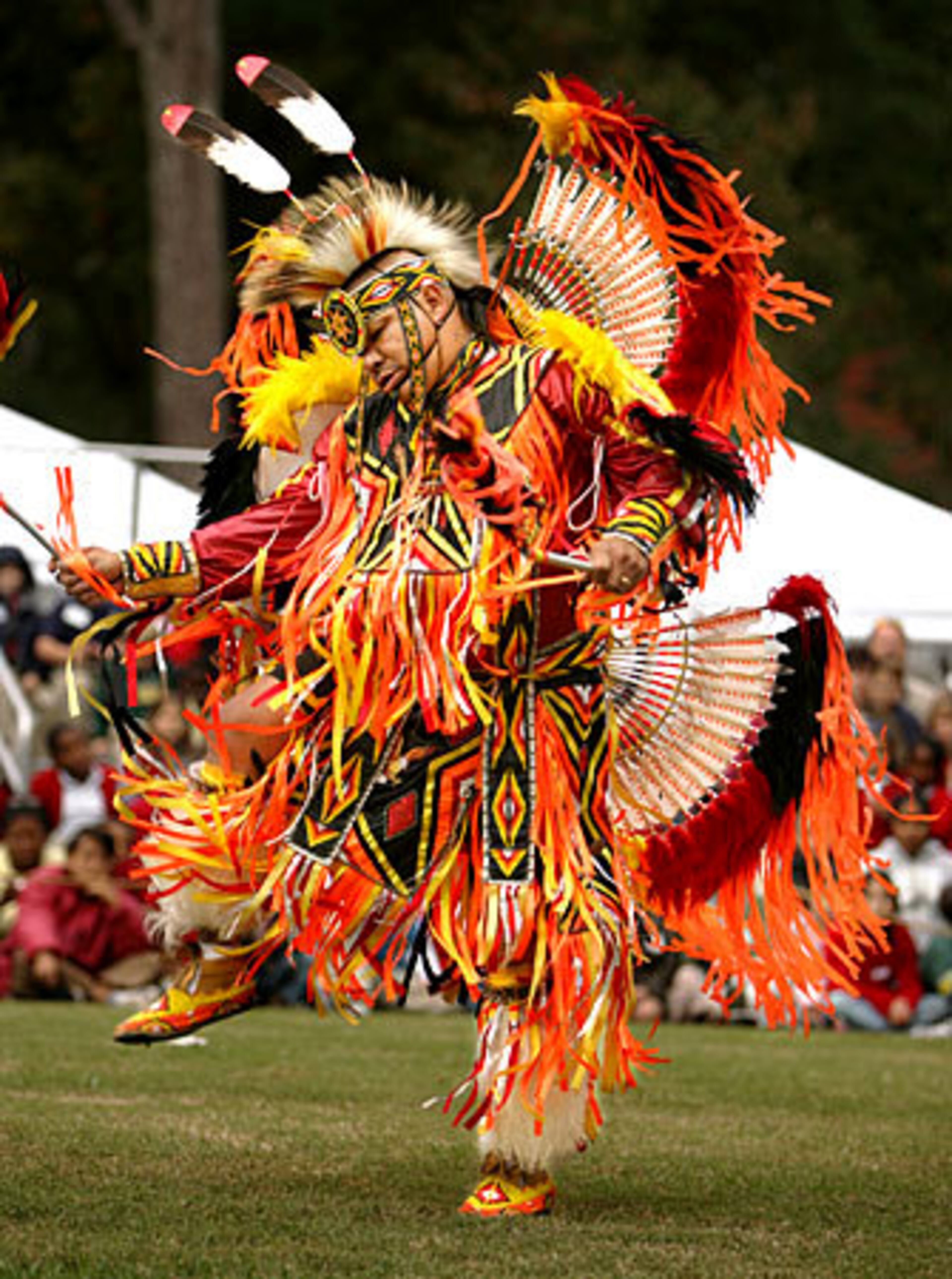 Award winning dancer, Robert Tramper, from Cherokee, N.C., in Cherokee dress does the Men's Fancy Dance
